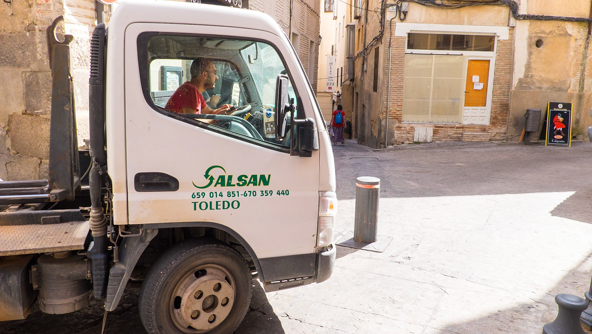 Photo 1 of 5: Truck approaches barrier. Driver dials cell phone number.