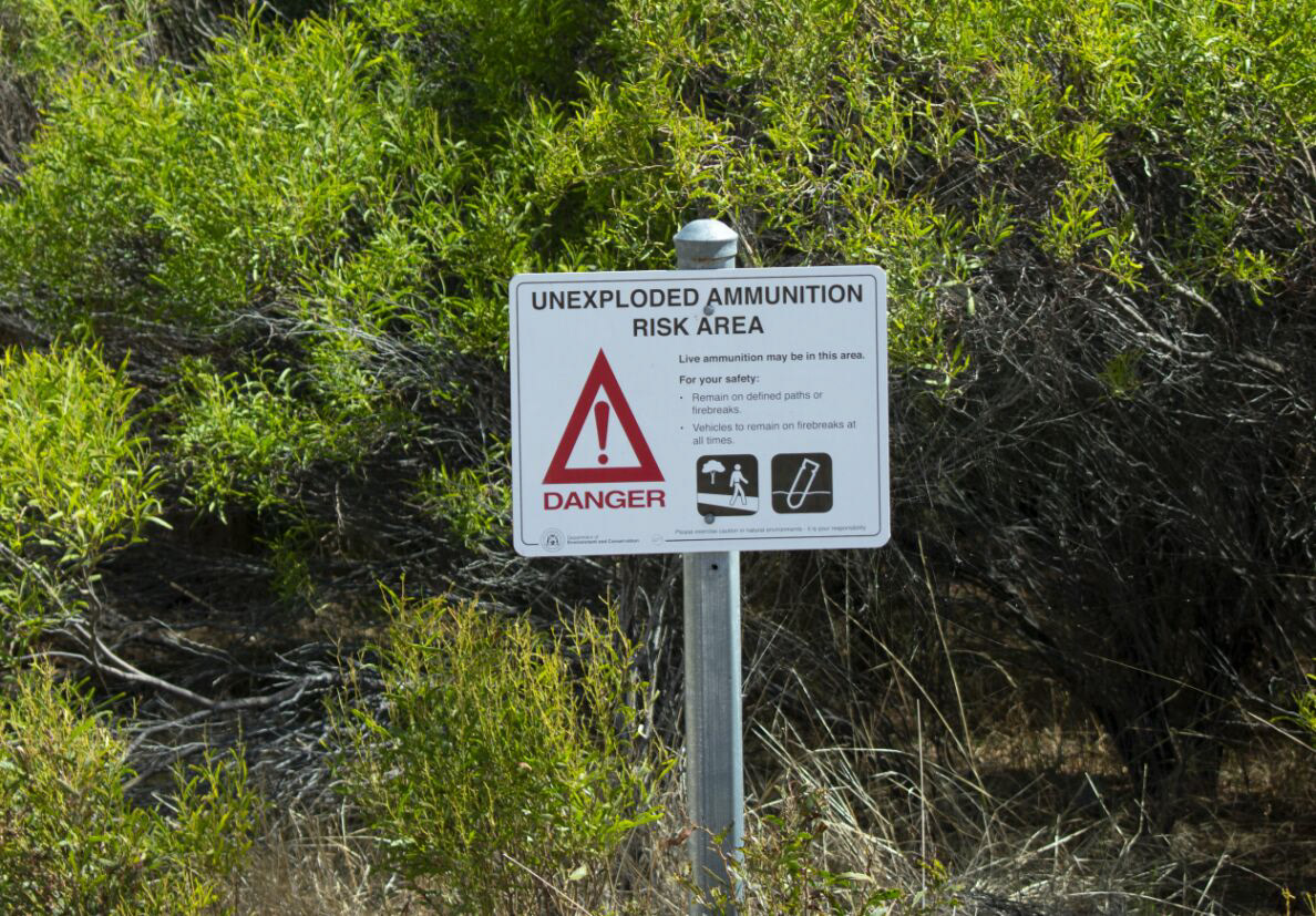 We went for a walk today by Lake Walyungup and saw this warning sign. The next picture shows the cool gals we found behind it.