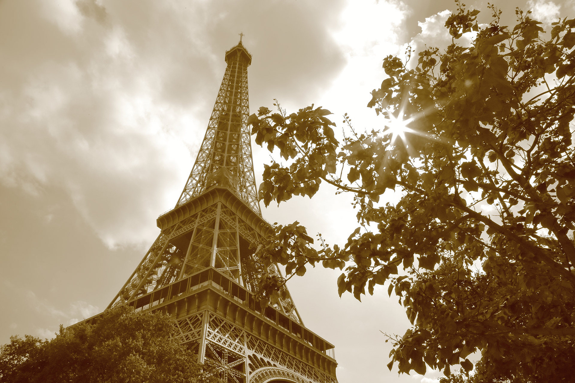 sepia-toned photograph of the eiffel tower in paris france