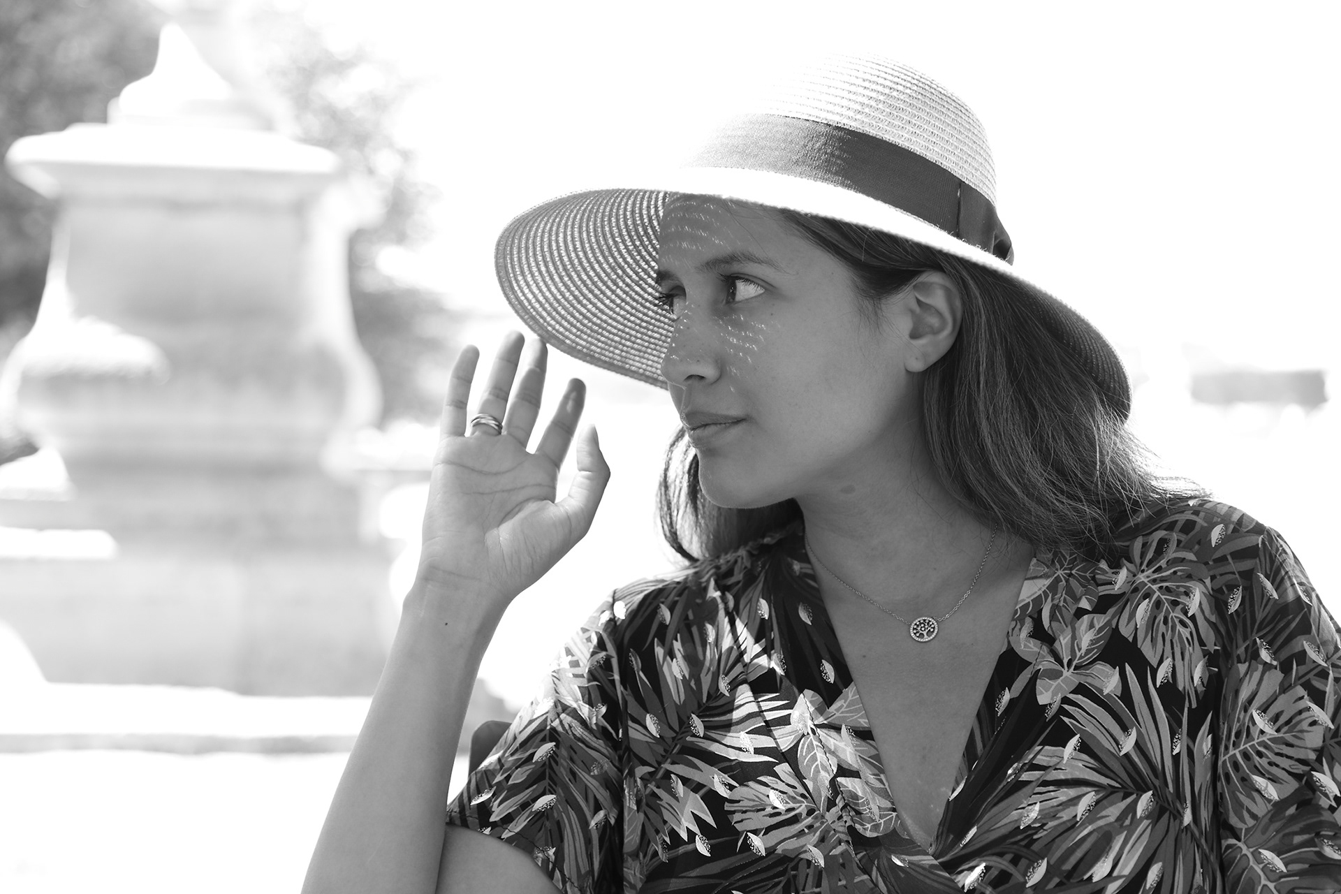 BW photo of woman in sun hat links to PORTRAIT section