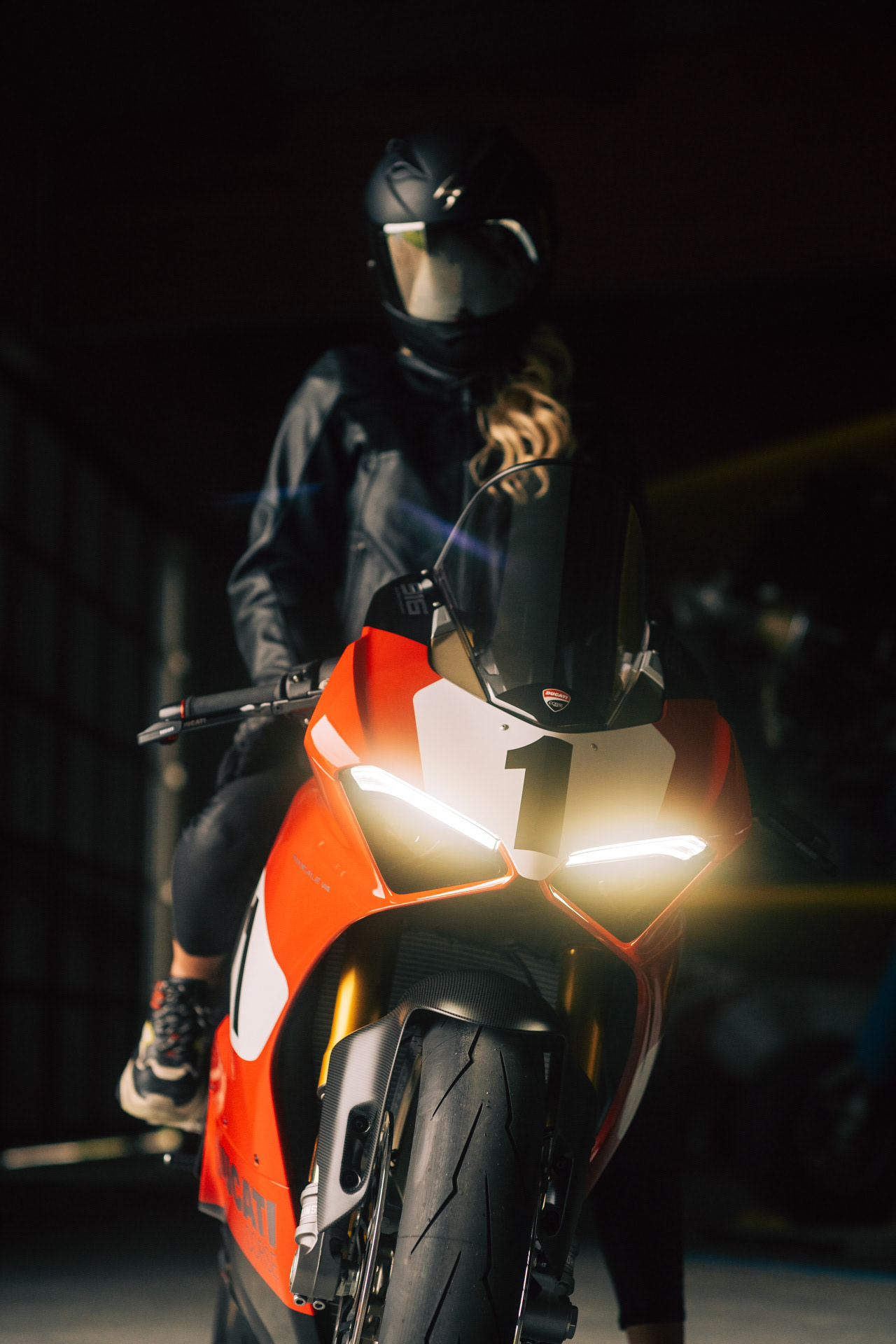 Nadine Wimmer X Ducati Panigale V4 in front of Boeing Stearman at Jesenwang Airfield