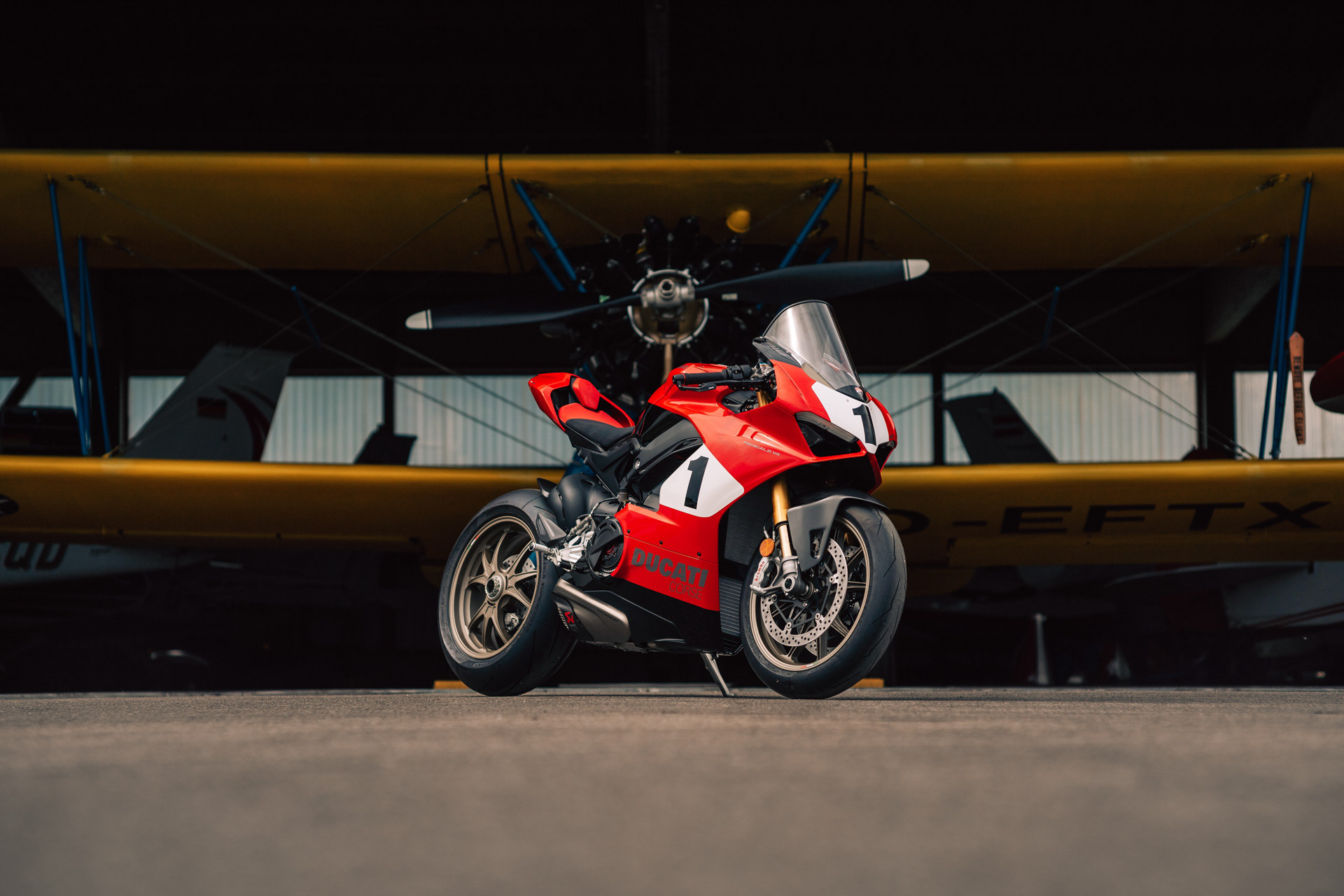 Ducati Panigale V4 in front of Boeing Stearman at Jesenwang Airfield