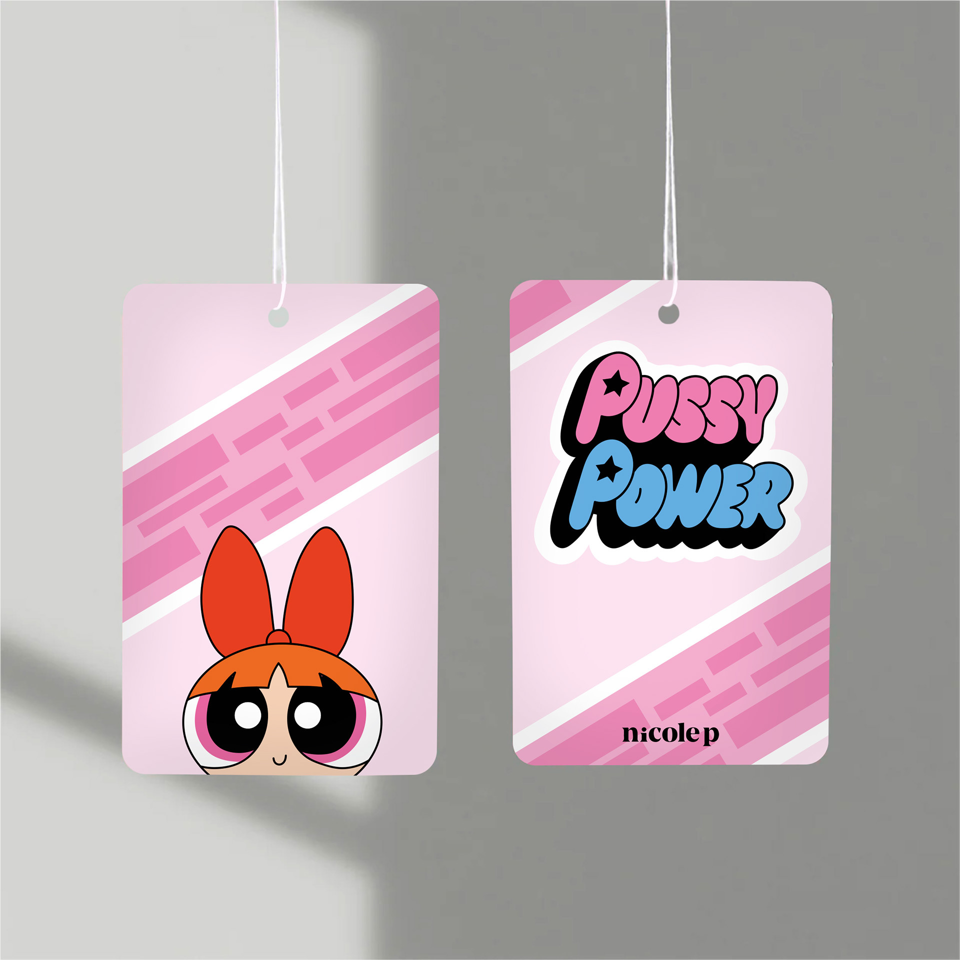 Mockup of the car air fresheners with PussyPower Lolly graphic
