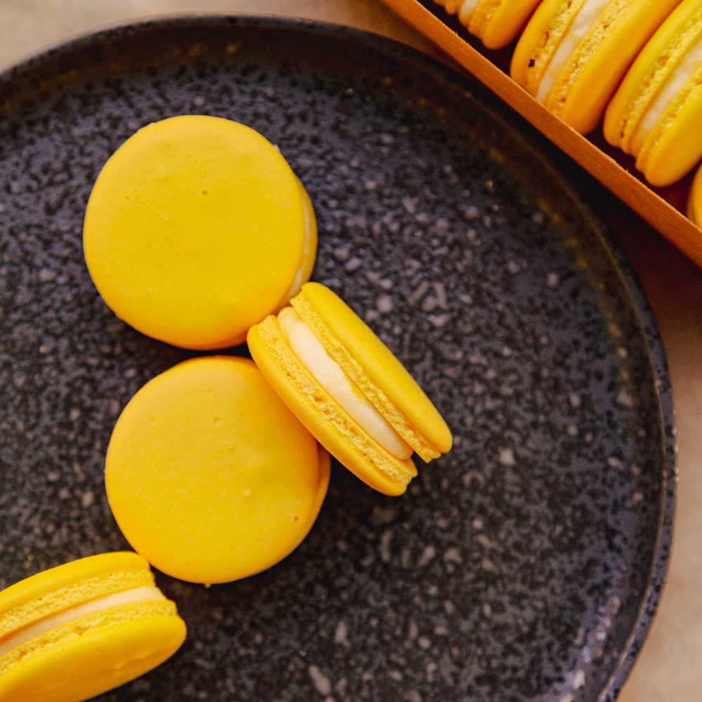 Lemon Curd Macarons: Almond Shells with Lemon Curd and a Lemon Zest Buttercream