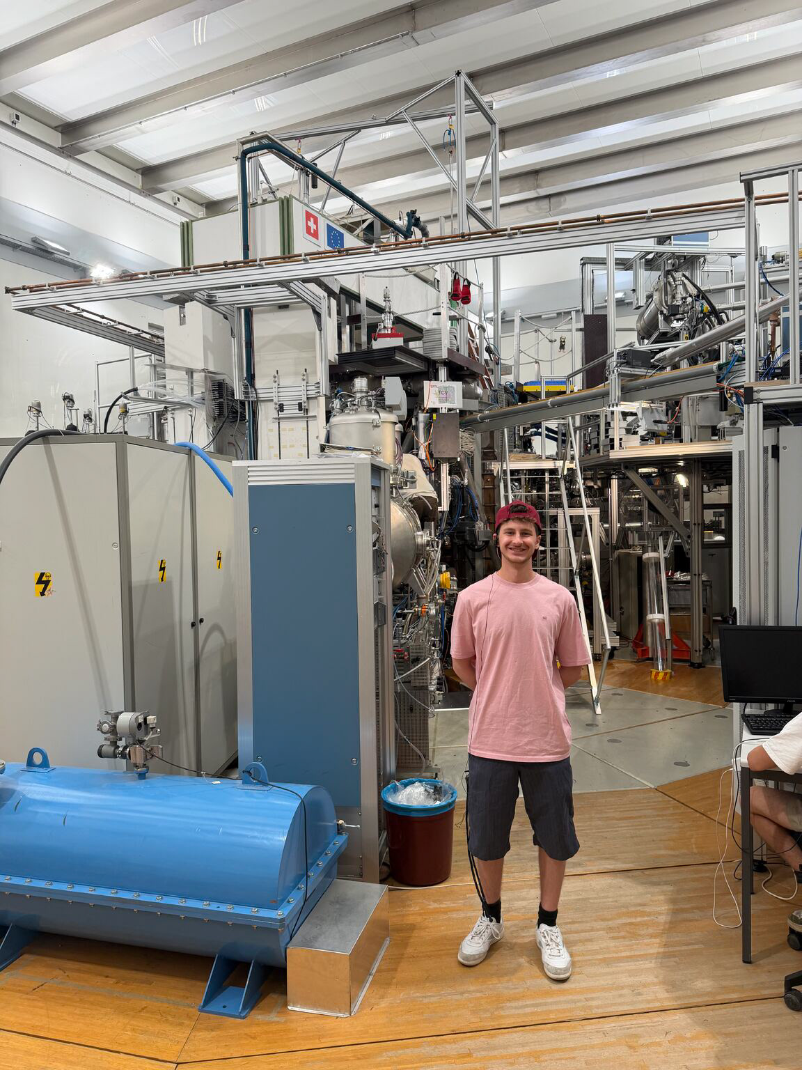 Becker in the experimental hall of the Swiss Plasma Center at EPFL in Lausanne