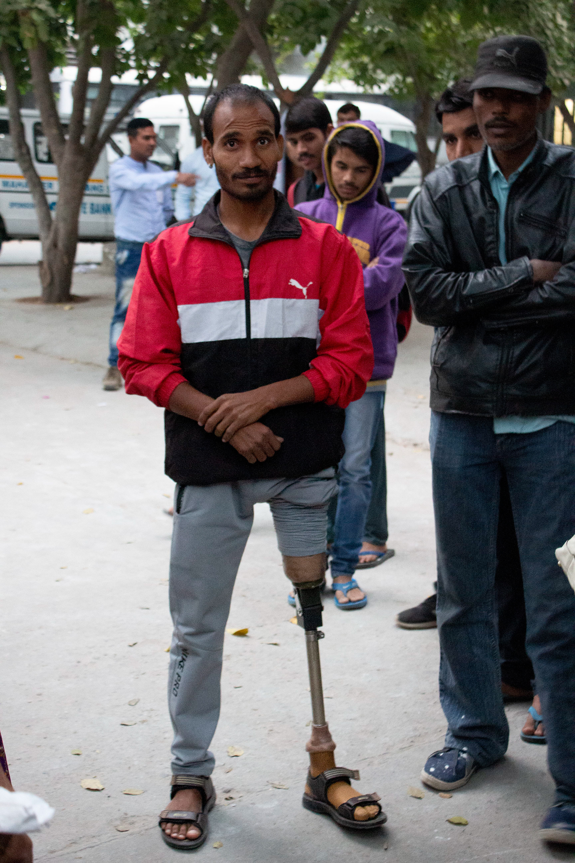 Recipients of Jaipur Foot prosthetic limbs are proud to show them.