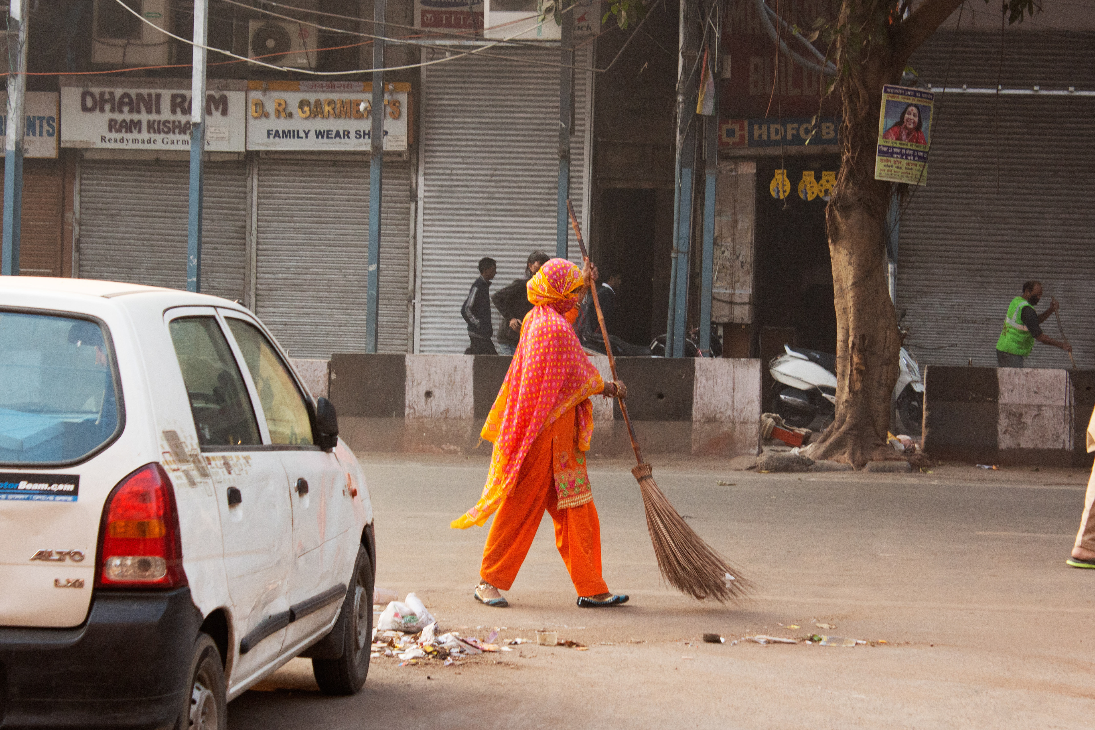 A woman sweeps early morning in Old Delhi - the only woman I saw outside until noon.