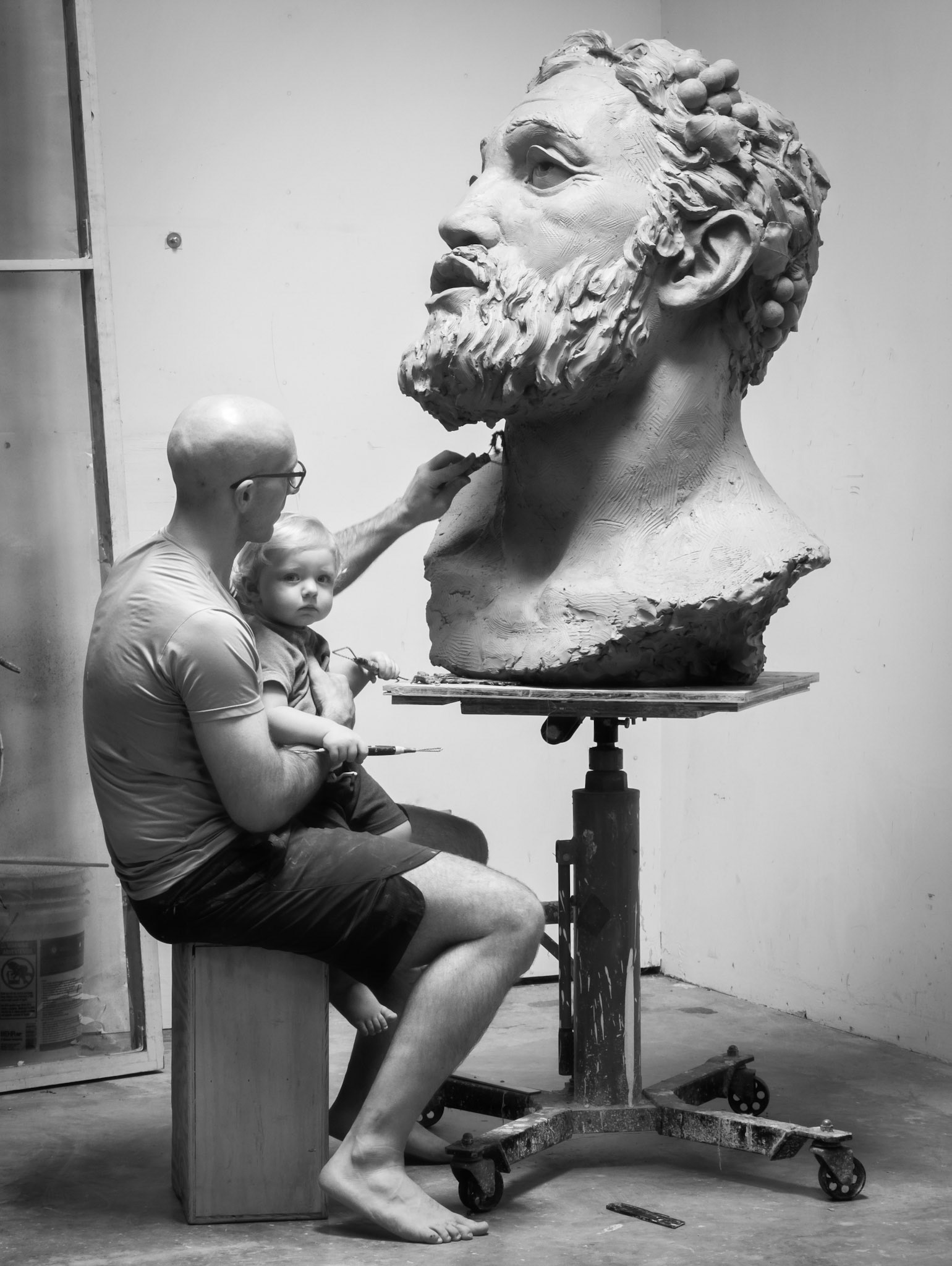Brett in the studio with his oldest son