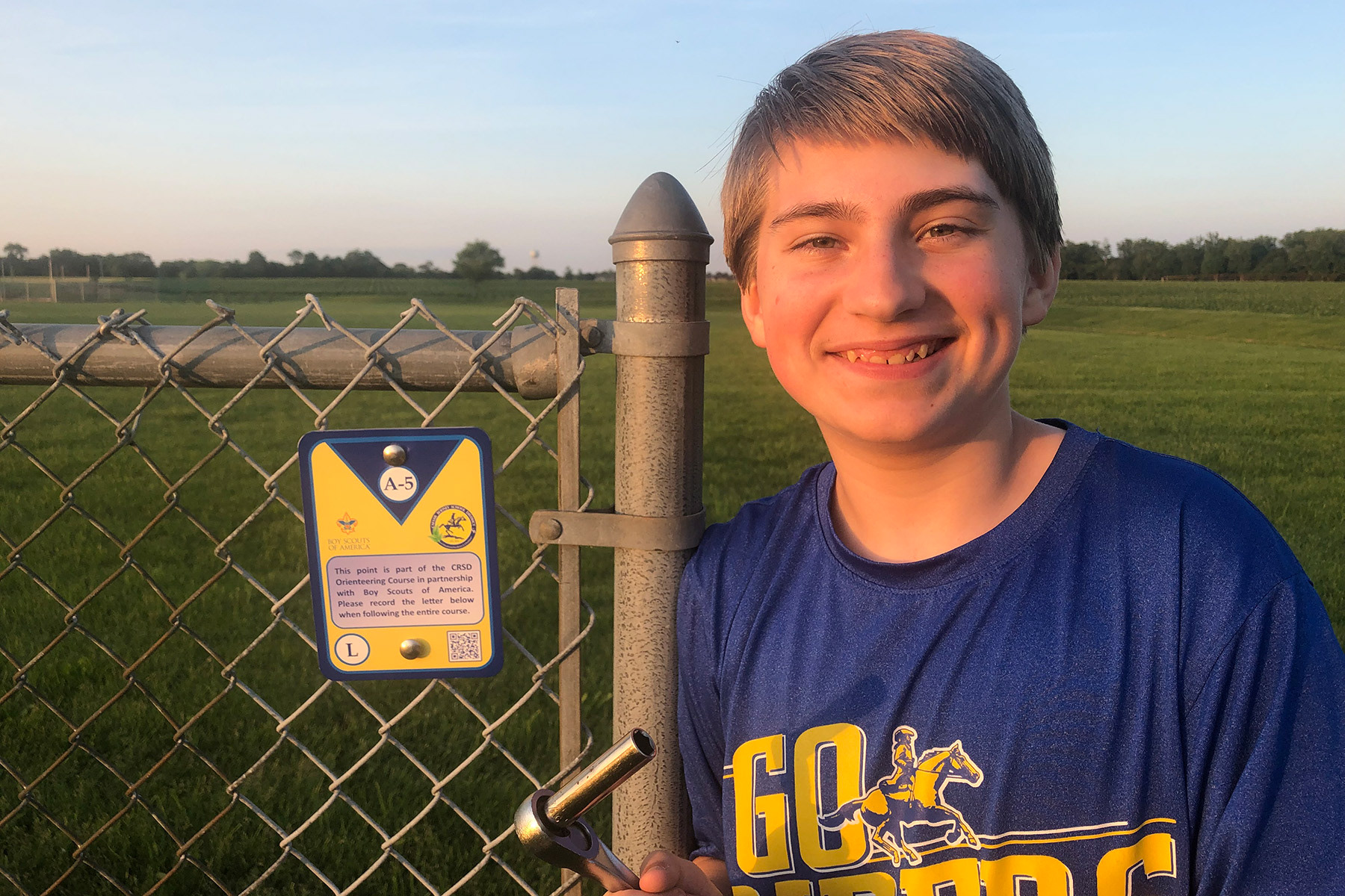 Ethan's Eagle Scout project was the first Orienteering Course at a public school in Delaware.  Please contact CR School District to see how to access this unique experience for your friends and family.  Ethan is smiling outside Postlethwait Middle School with one of the course markers.