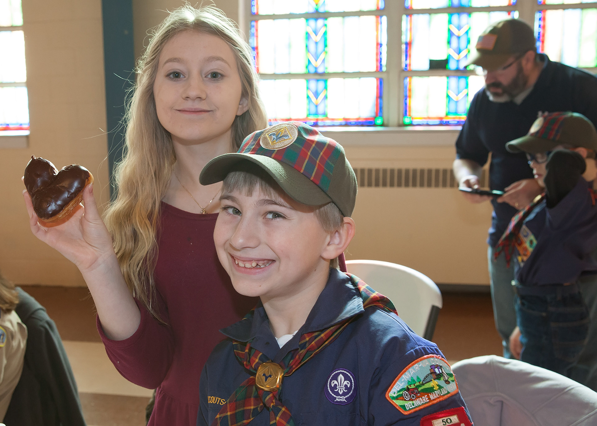 Scouts played a big part of our family. Taking a break from raising wooden cars at the Pinewood Derby, they found a delicous treat.