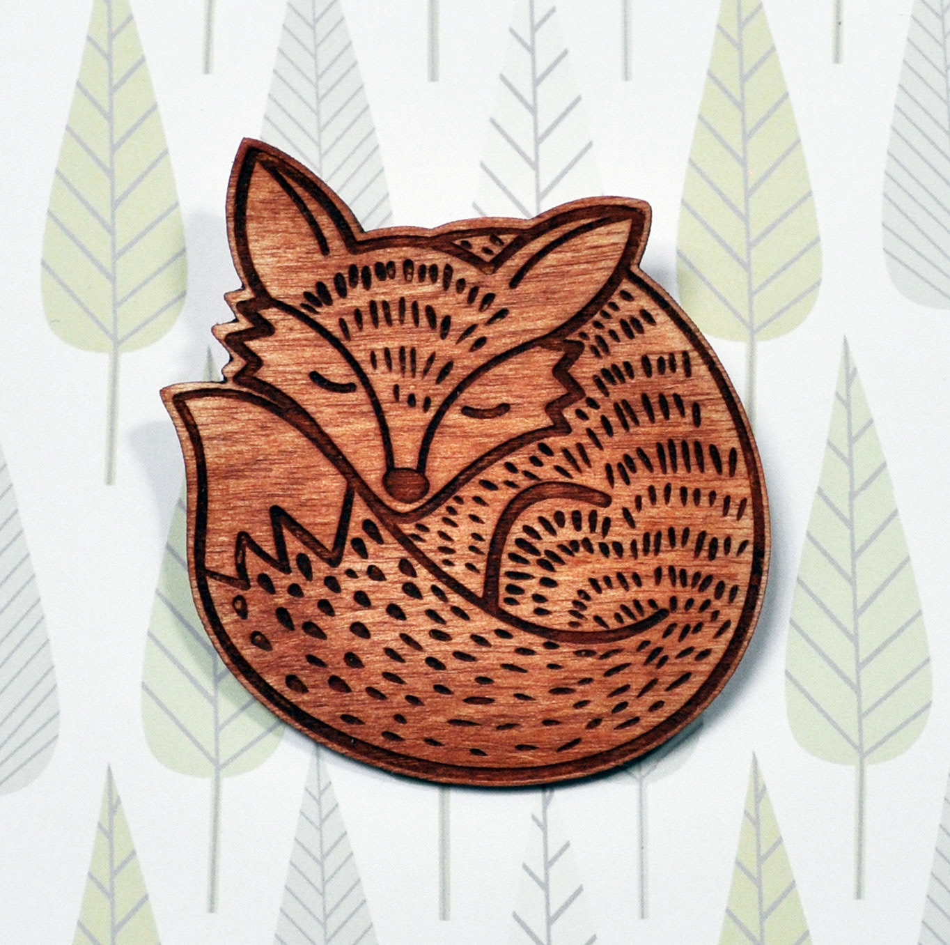 Sleeping fox pendant	wood £4.95