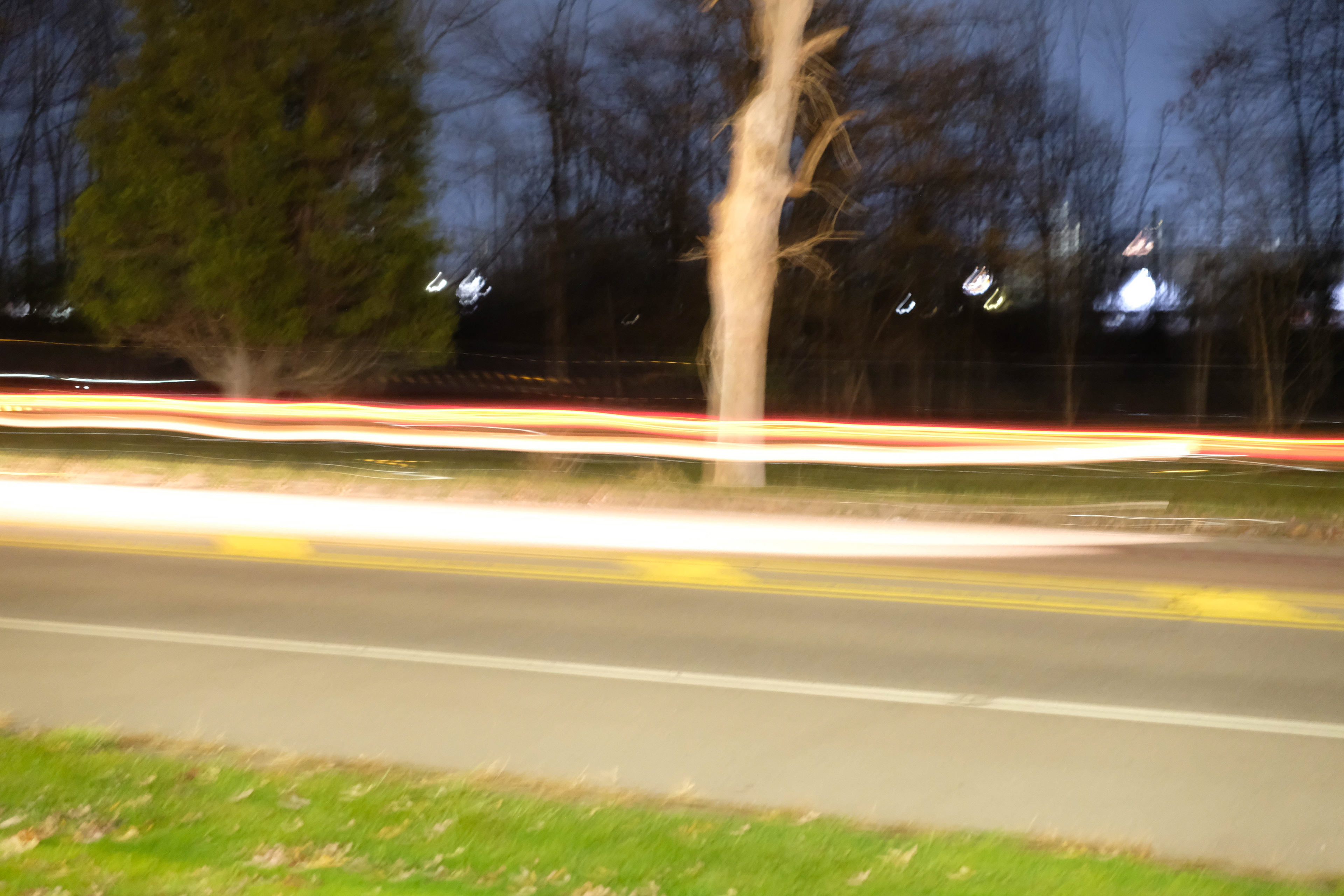 A long exposure photograph of car taillights