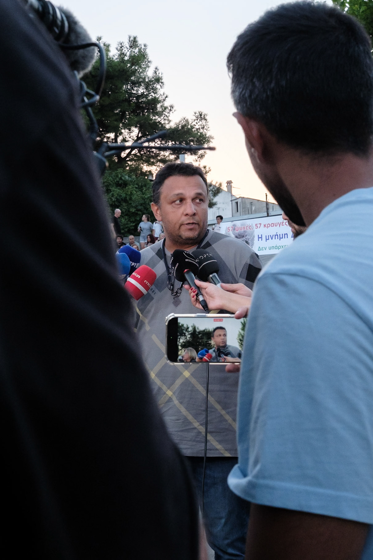 Panos Routsi, who lost his son, talking to the media before the event dedicated to the victims of the train wreckage of Tempi 2023. Organised by local ngo Kialli of Thermi & supported by the local community. Thermi, Thessaloniki, Greece, 10.09.2025 by Maria Kalafatsi