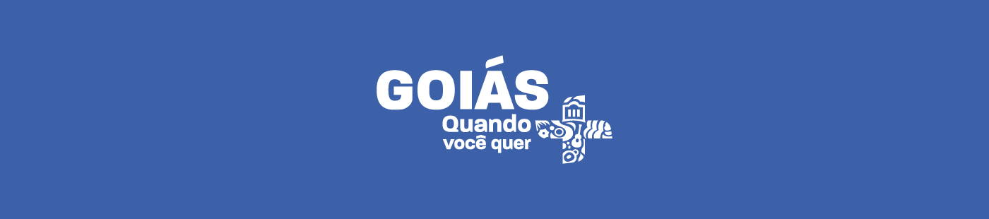 Logo da Campanha "Goiás, quando você quer +" em versão monocromática branca em fundo azul.