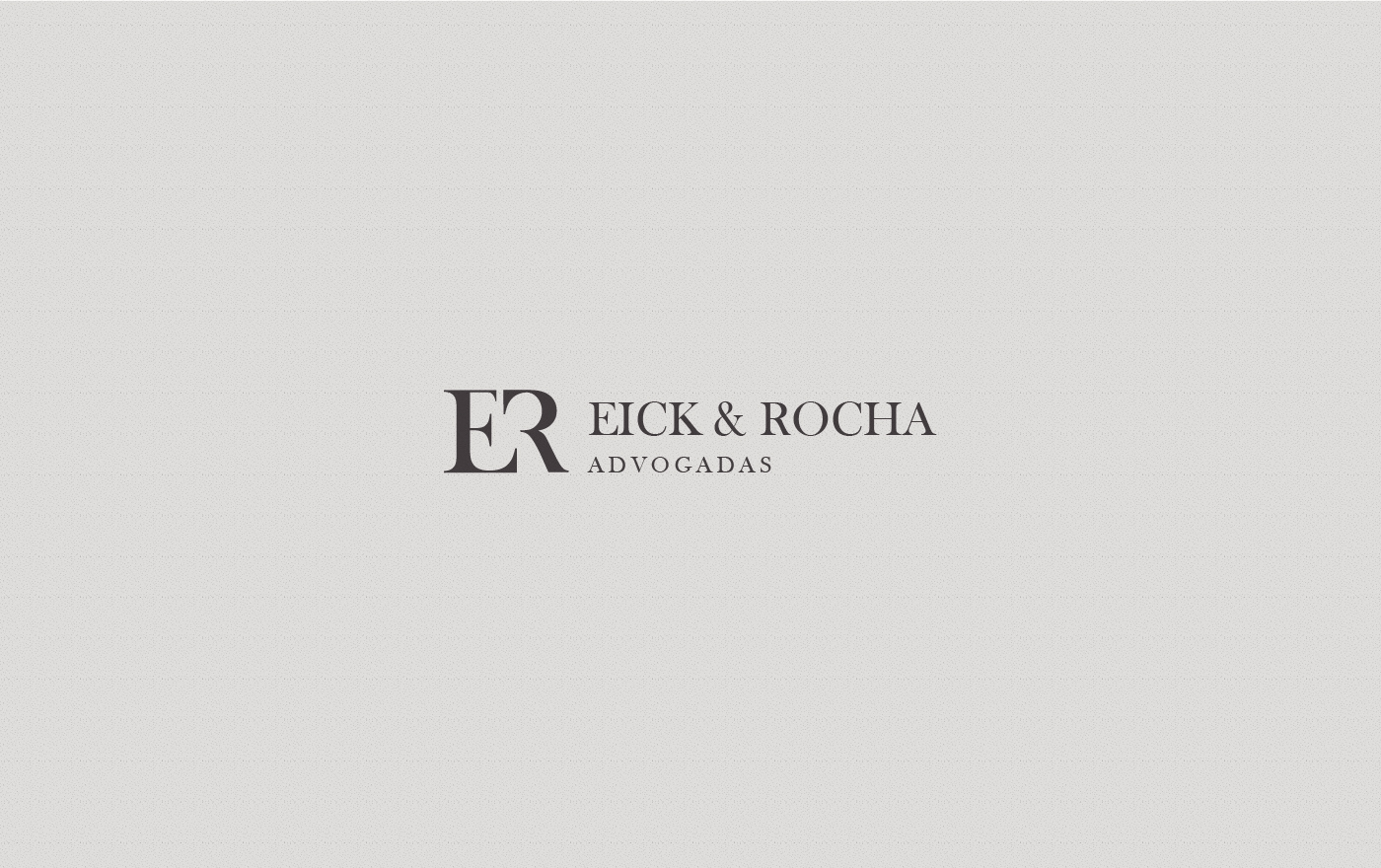 Logotipo da Eick & Rocha Advogadas na versão horizontal, cor marrom e fundo claro.