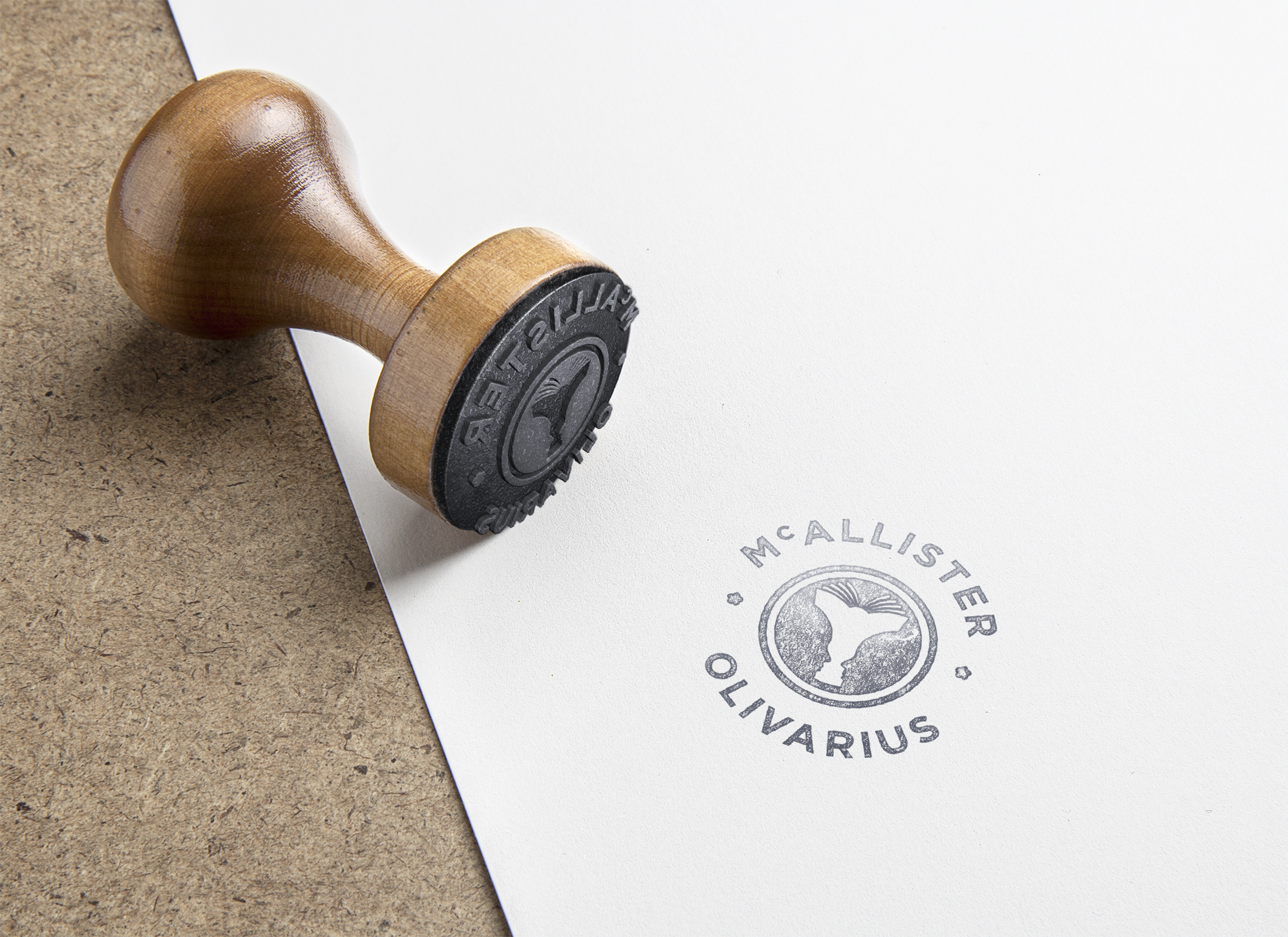 A black stamp with the McAllister Olivarius bespoke logo.