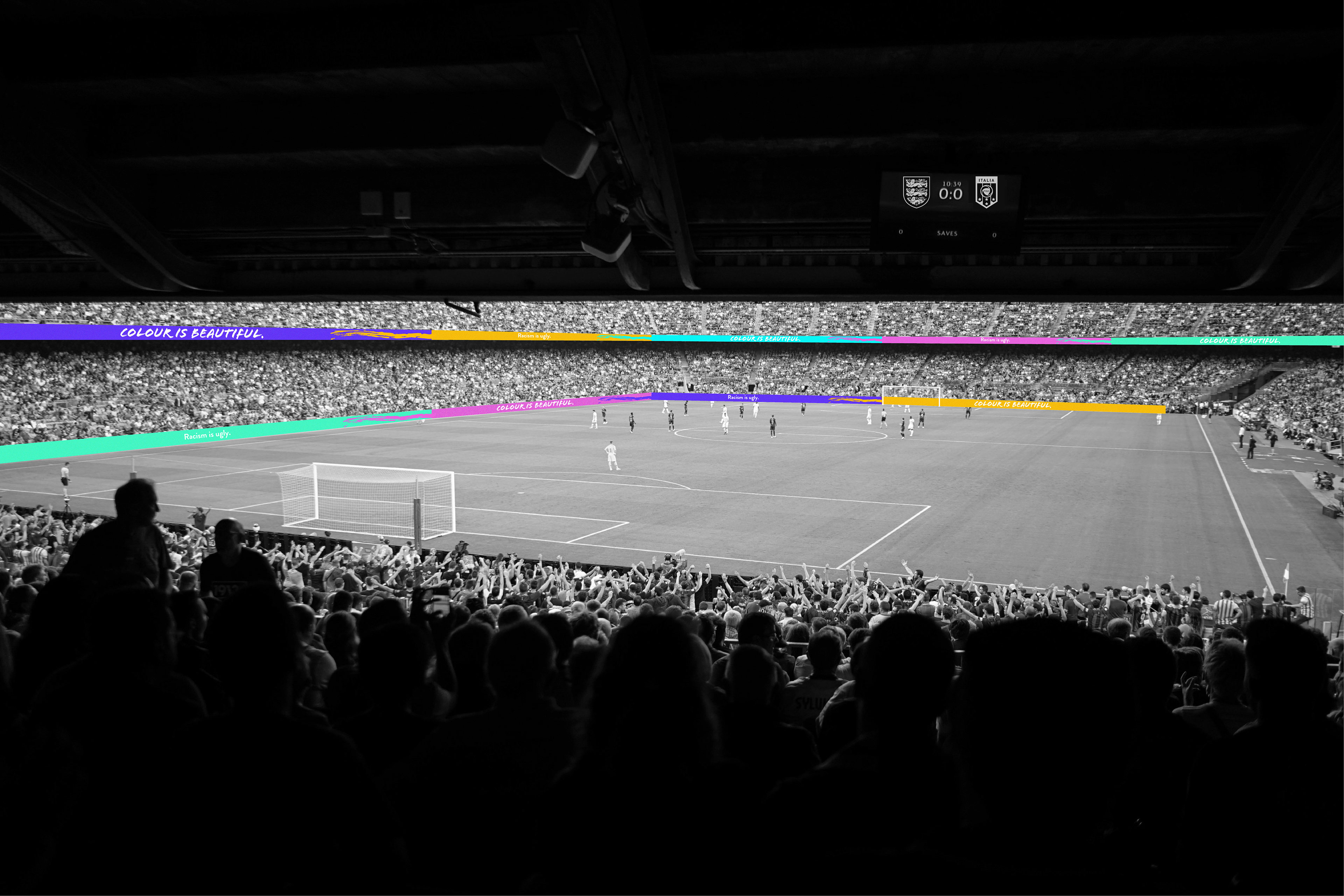 A stadium featuring the Colour is Beautiful campaign signage on the advertising hoarding.