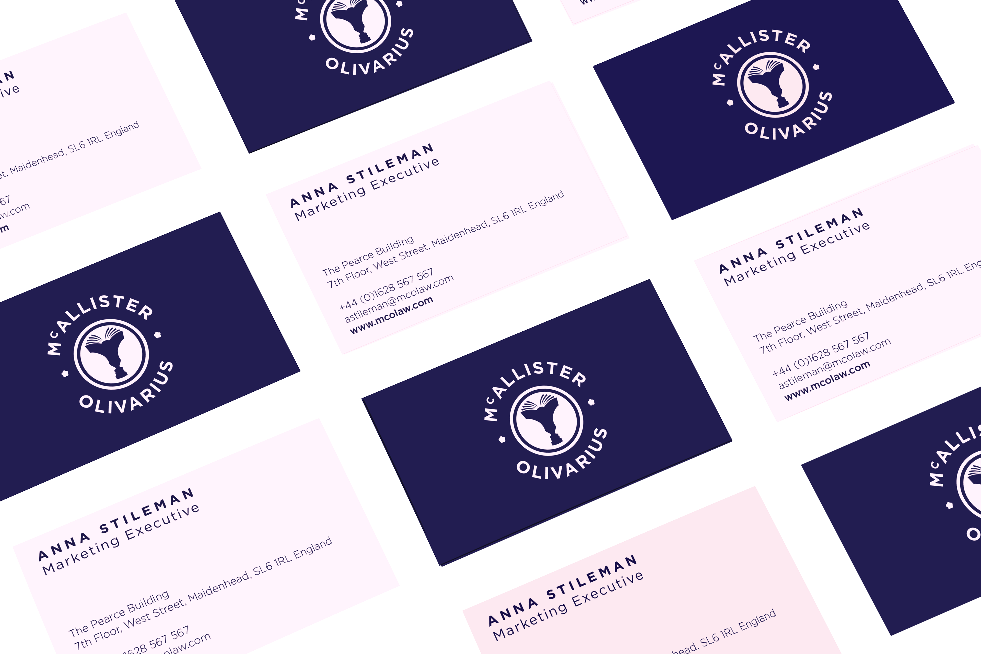 Business cards featuring the McAllister Olivarius bespoke logo in blue and subtle pink.