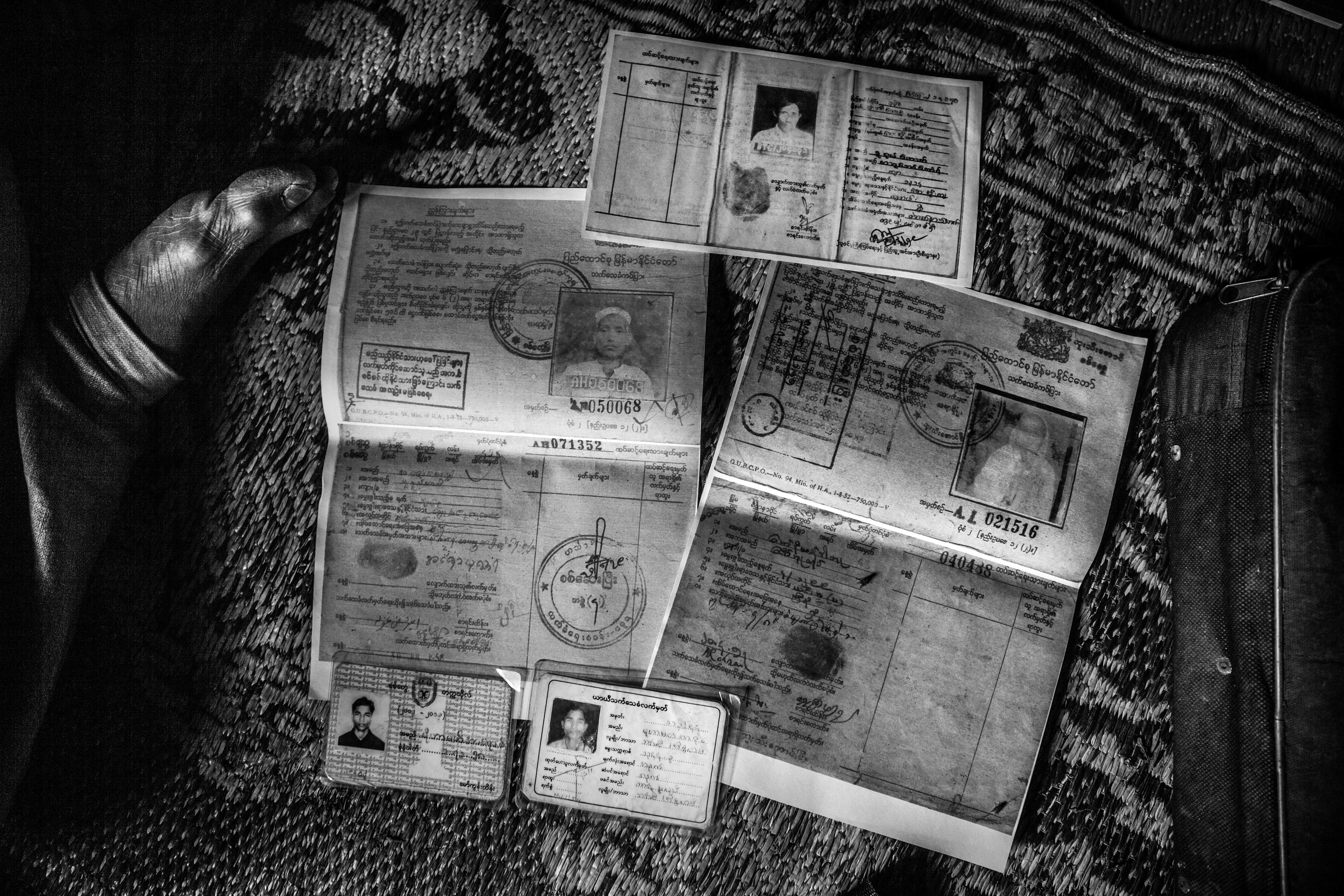 "Proof of Existence." Leda Camp, Teknaf, Bangladesh. Jan 2016. Many Rohingya who fled their homeland never had the time nor the capacity to bring anything with them except for their most important possessions. In the case of this man, those included his and his wife’s various identity cards and passports from Myanmar. Unfortunately, they are no longer valid or respected by any government.