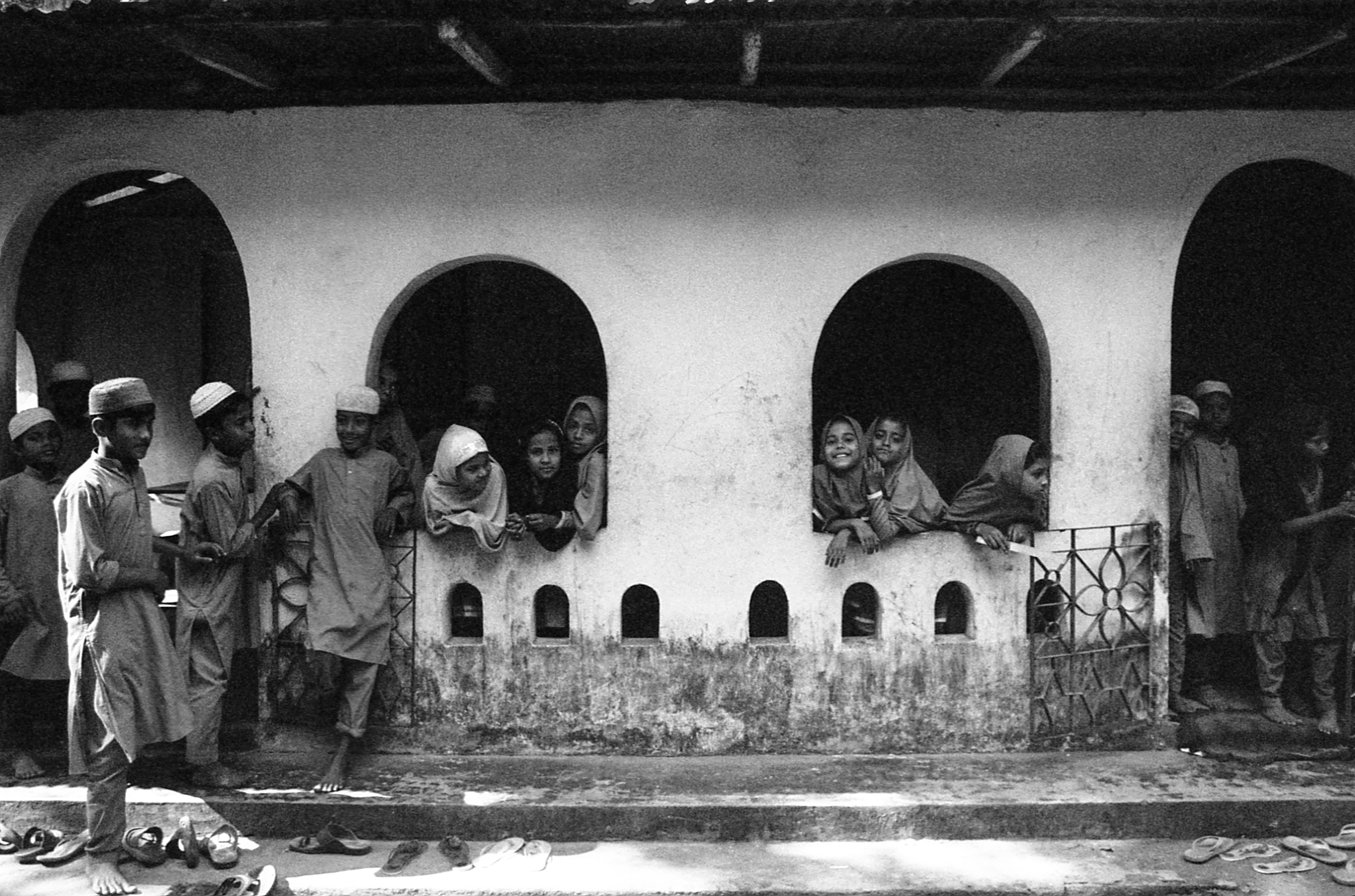 Shamlapur, Bangladesh. The older students hang around their classroom during a break.