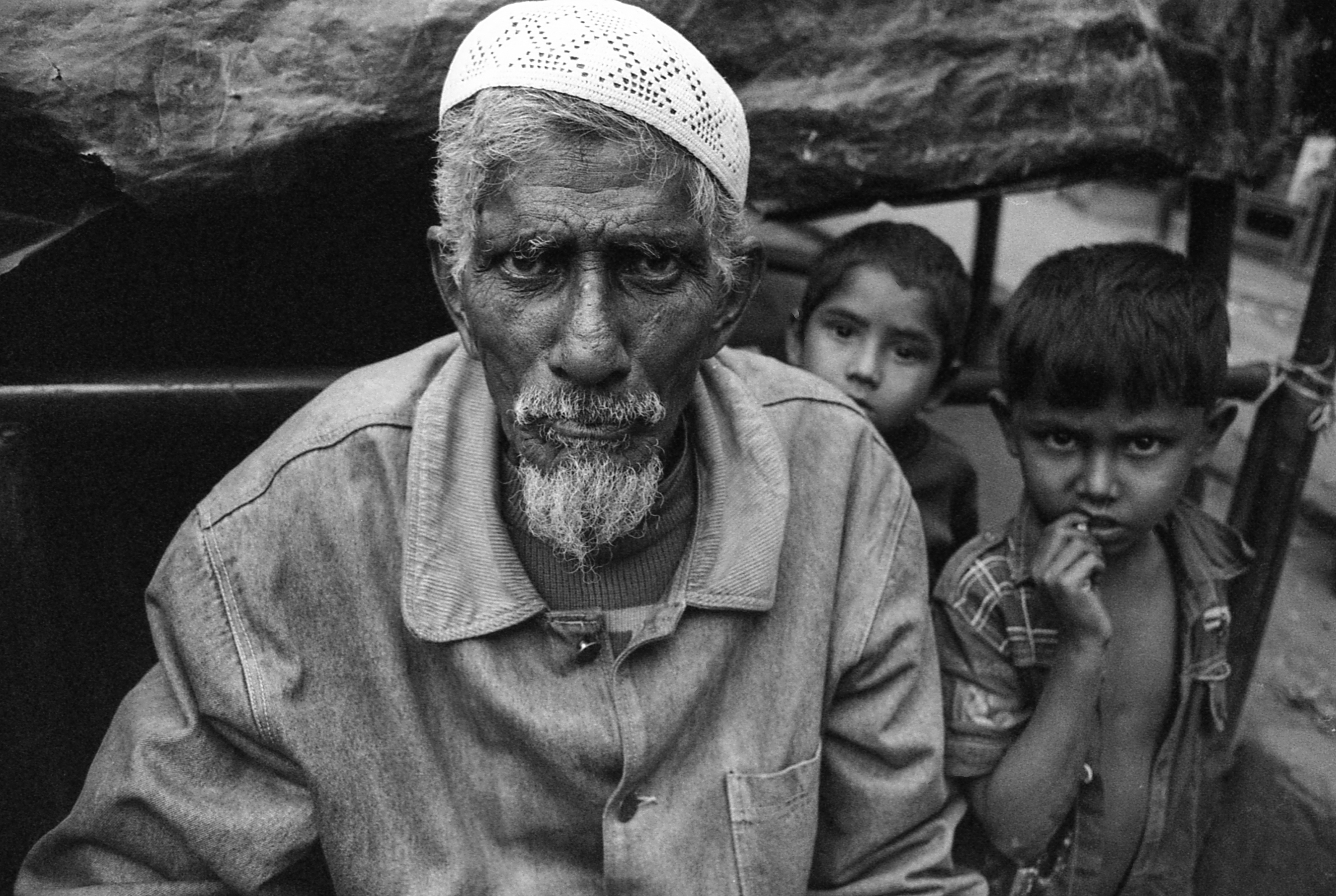 Leda Camp, Teknaf, Bangladesh. Rohingya man and two children.