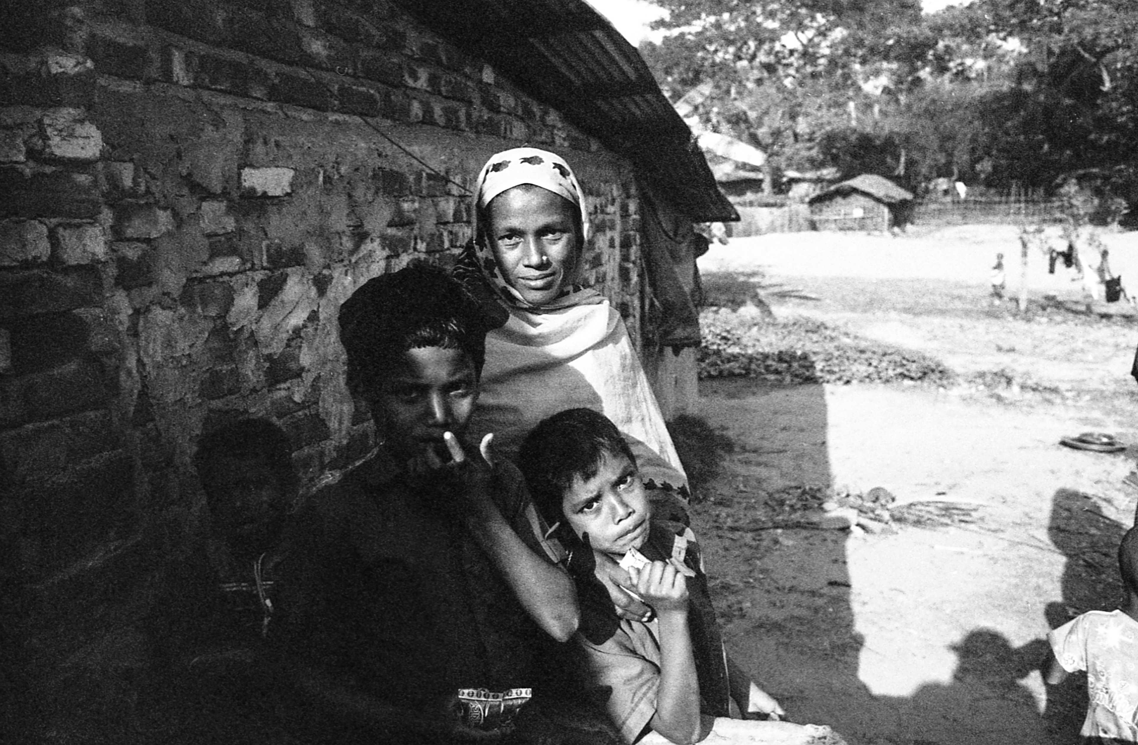 Shamlapur, Bangladesh. A Rohingya woman and children.