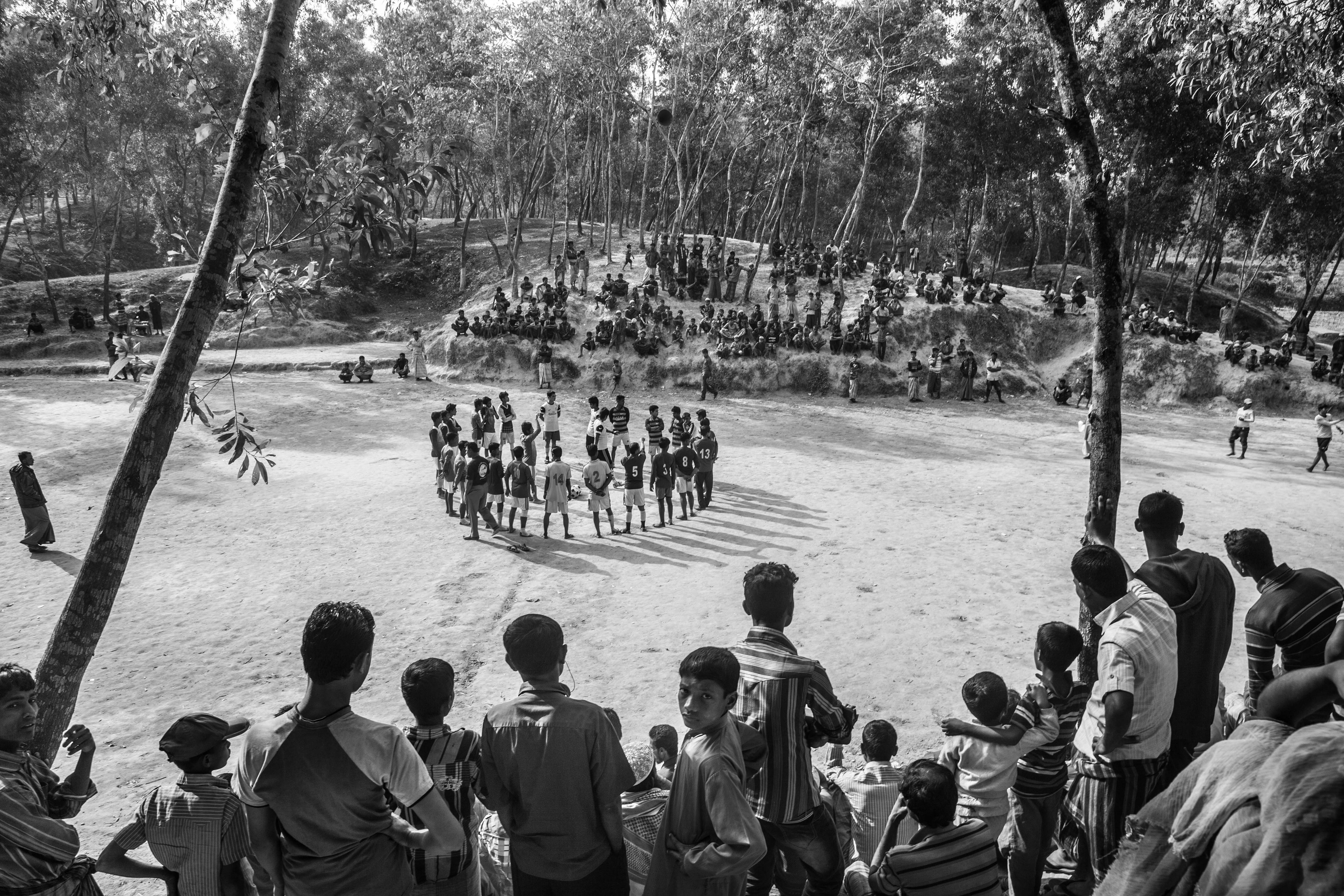 "Football Tourney." Leda Camp, Teknaf, Bangladesh. Jan 2016. In order to maintain some idea of home and community, the various blocks in this refugee camp have organized teams to participate in a football tournament. It’s a brief respite from the daily troubles they encounter and an exercise in their solidarity.