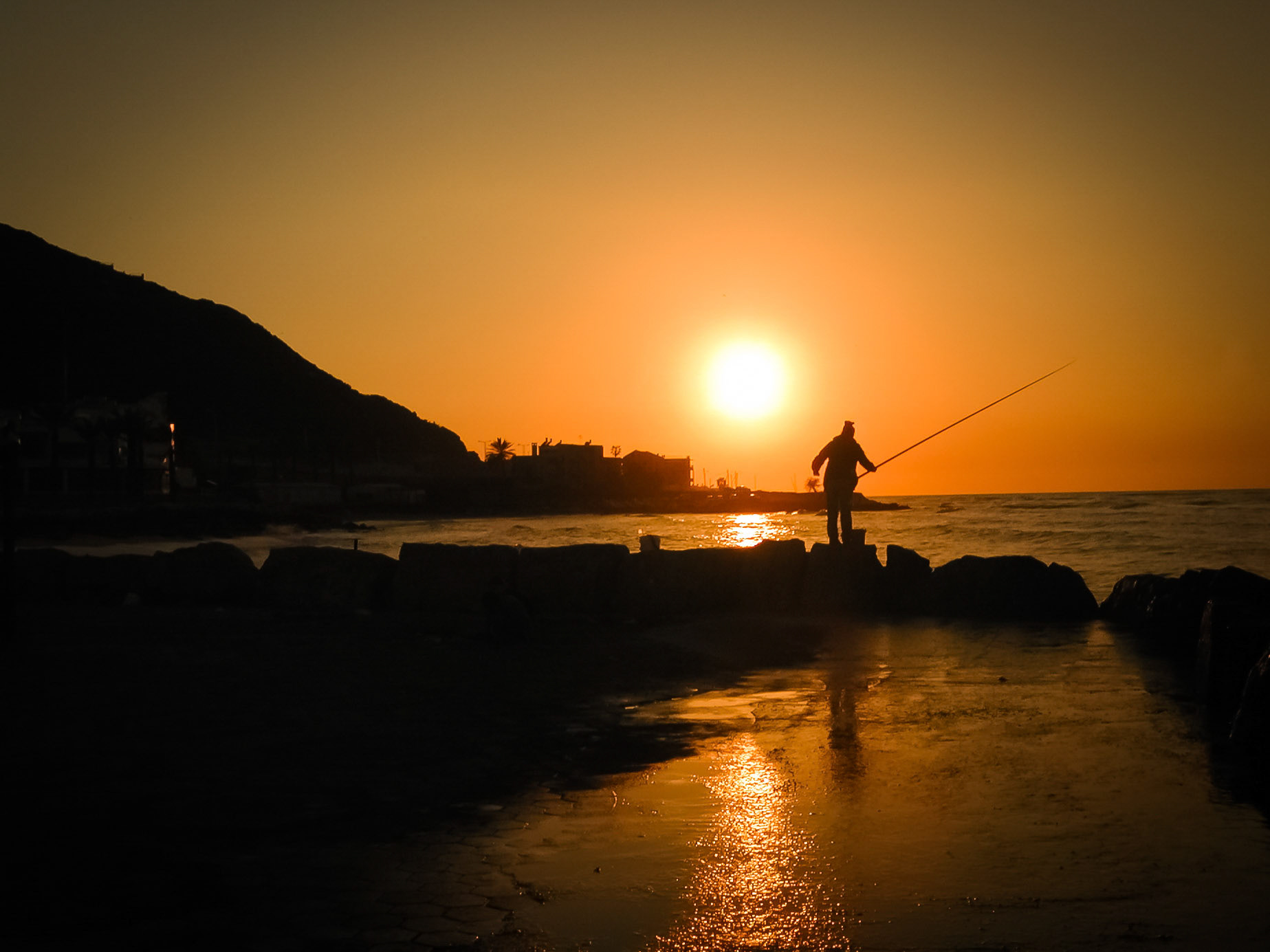 Fisherman on the Beach