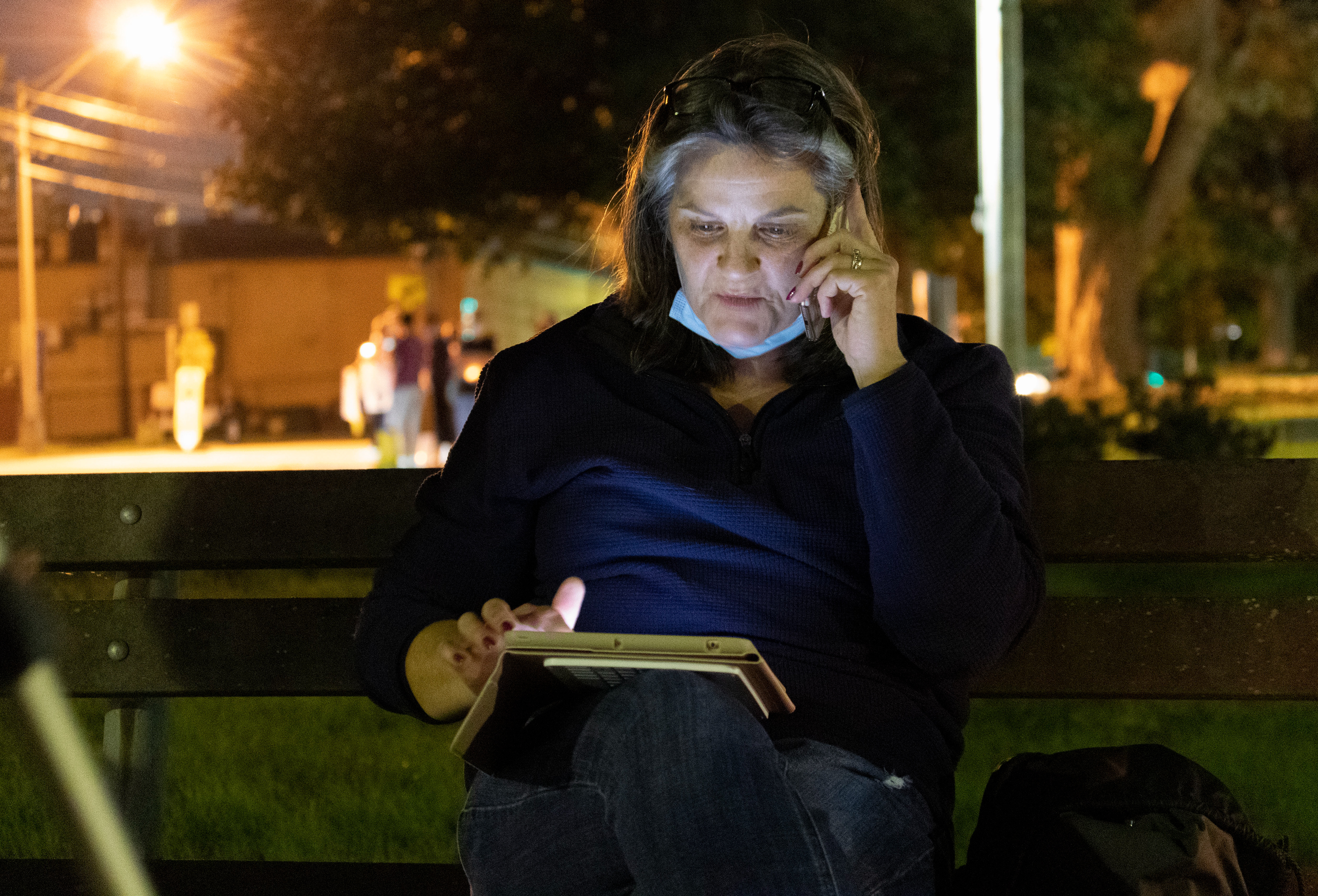 RASE NJ's member Janelle Ivry phones in to Ramsey tele-hall to voice her concerns outside of Ramsey Town Hall. (Photo/Sunah Choudhry)