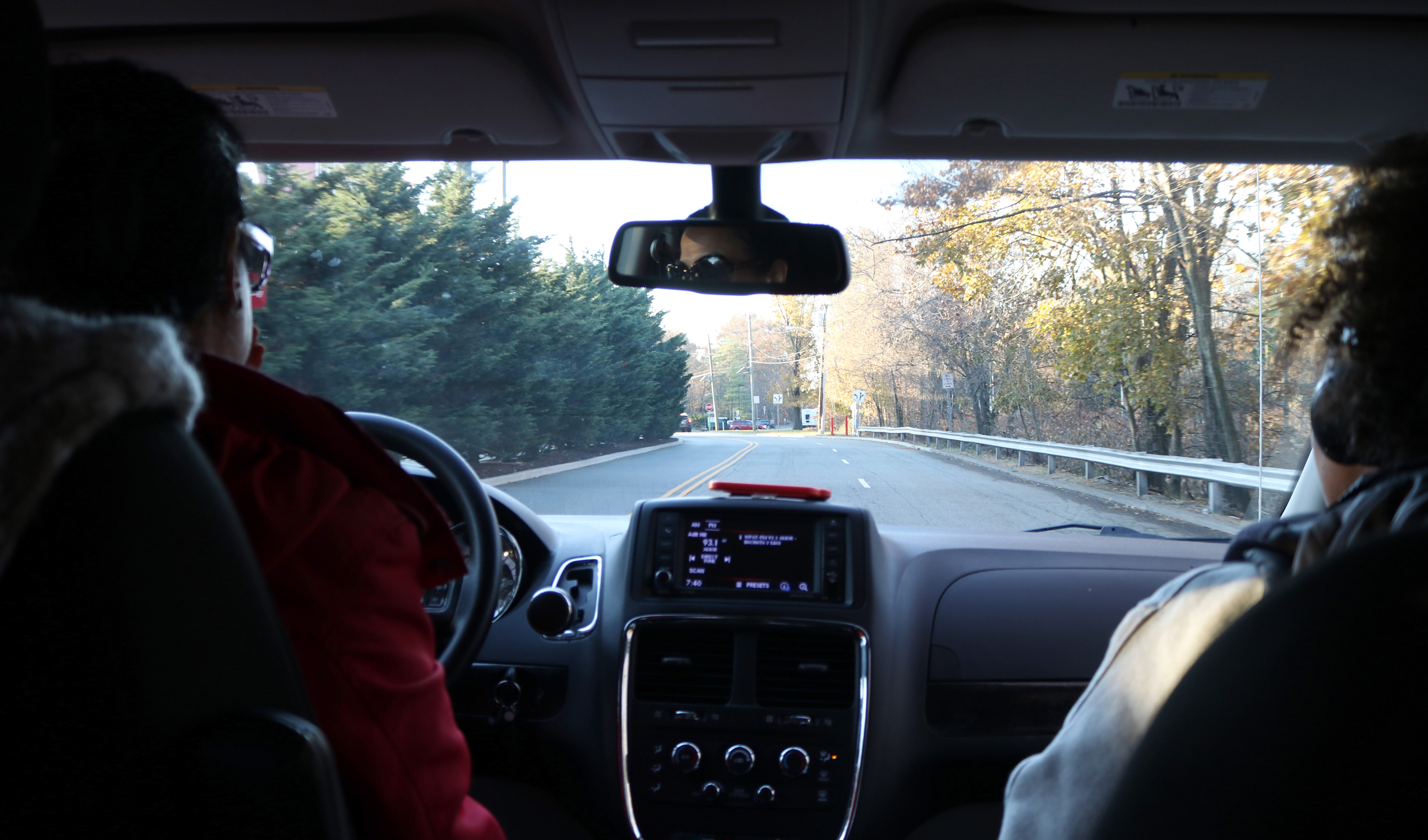 MONTCLAIR, NJ 11/21/2019 TRINITY’S FIRST RIDE: After getting out of the Uber and getting into the Persons with Disabilities (PWD) shuttle, Corney rides with Yvelices Nunez (left) per their routine in the morning.  -Photo by Sunah E. Choudhry