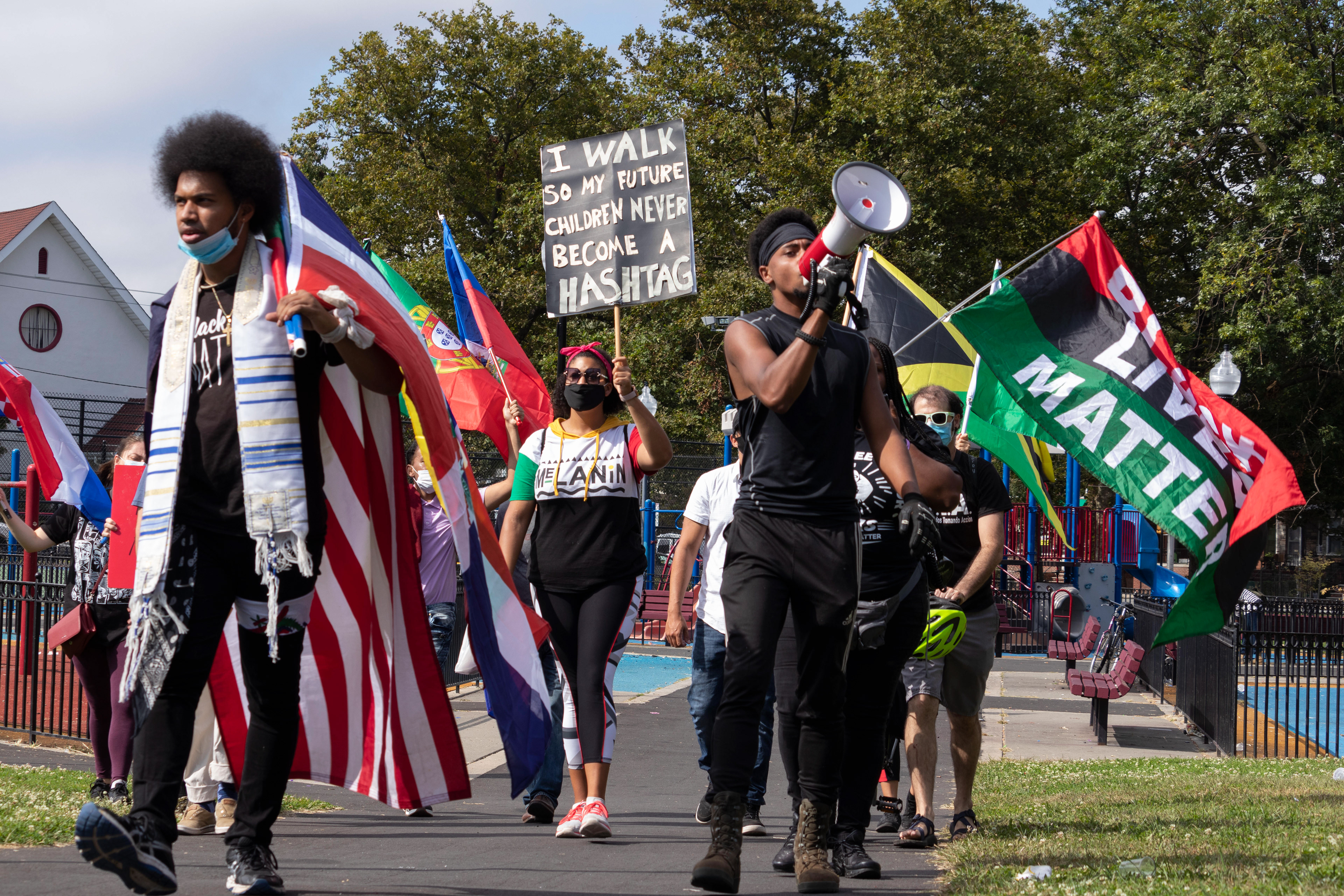 Rostafa leads protesters in chants as they enter Berry Land Park stating, “What do we want? A CCRB. When do we want it? Now.” A CCRB is a Civilian Complaint Review board meant to oversee a police force. (Photo/Sunah Choudhry)