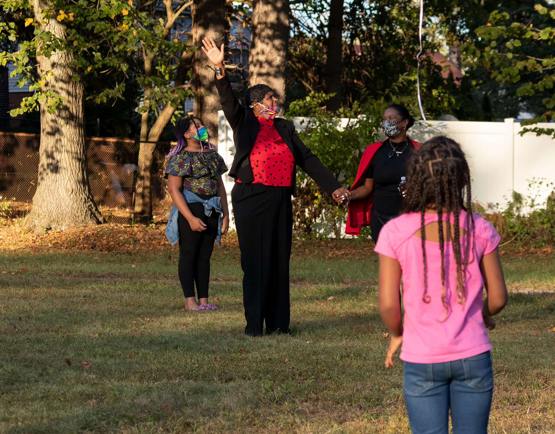 Pannell’s mother Thelma Danzler and sister Natacha Pannell release their balloons into the air with children in attendance  in remembrance of Phillip Pannell on his 47th birthday at Bernard E. Brooks park in Teaneck on Saturday, October 3rd, 2021. (Photo/Sunah Choudhry)