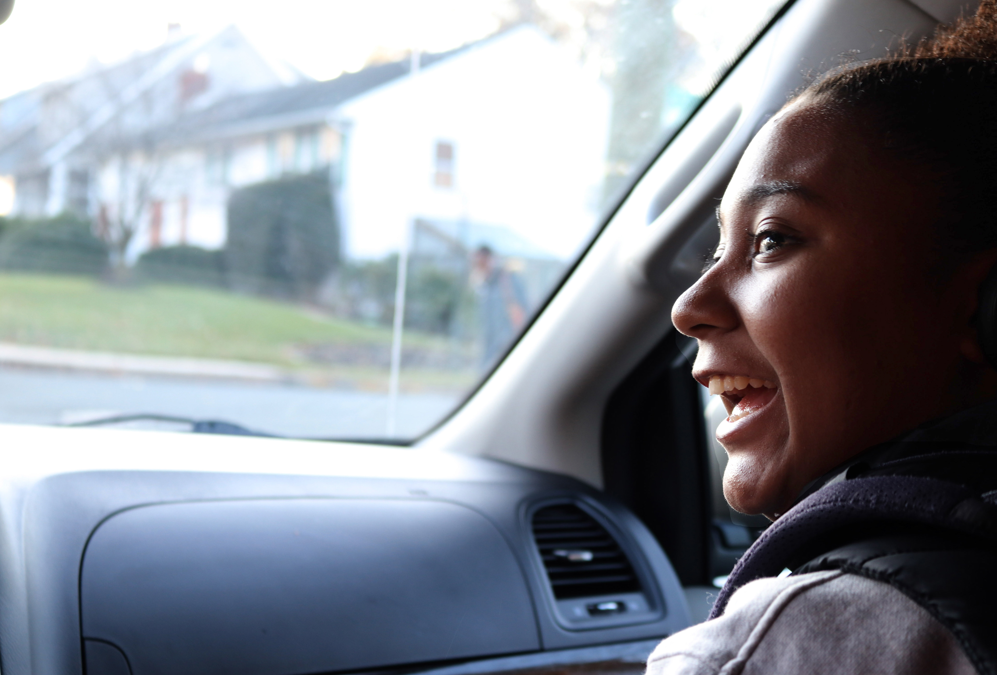 MONTCLAIR, NJ 11/21/2019 TRINITY JOKES AROUND: Trinity Corney jokes with the shuttle driver, Yvelices Nunez about construction on campus. Nunez asks everyone in the van when we think College Hall will be done. Corney’s prediction is that it will not be finished by the due date of fall 2020 semester.  -Photo by Sunah E. Choudhry