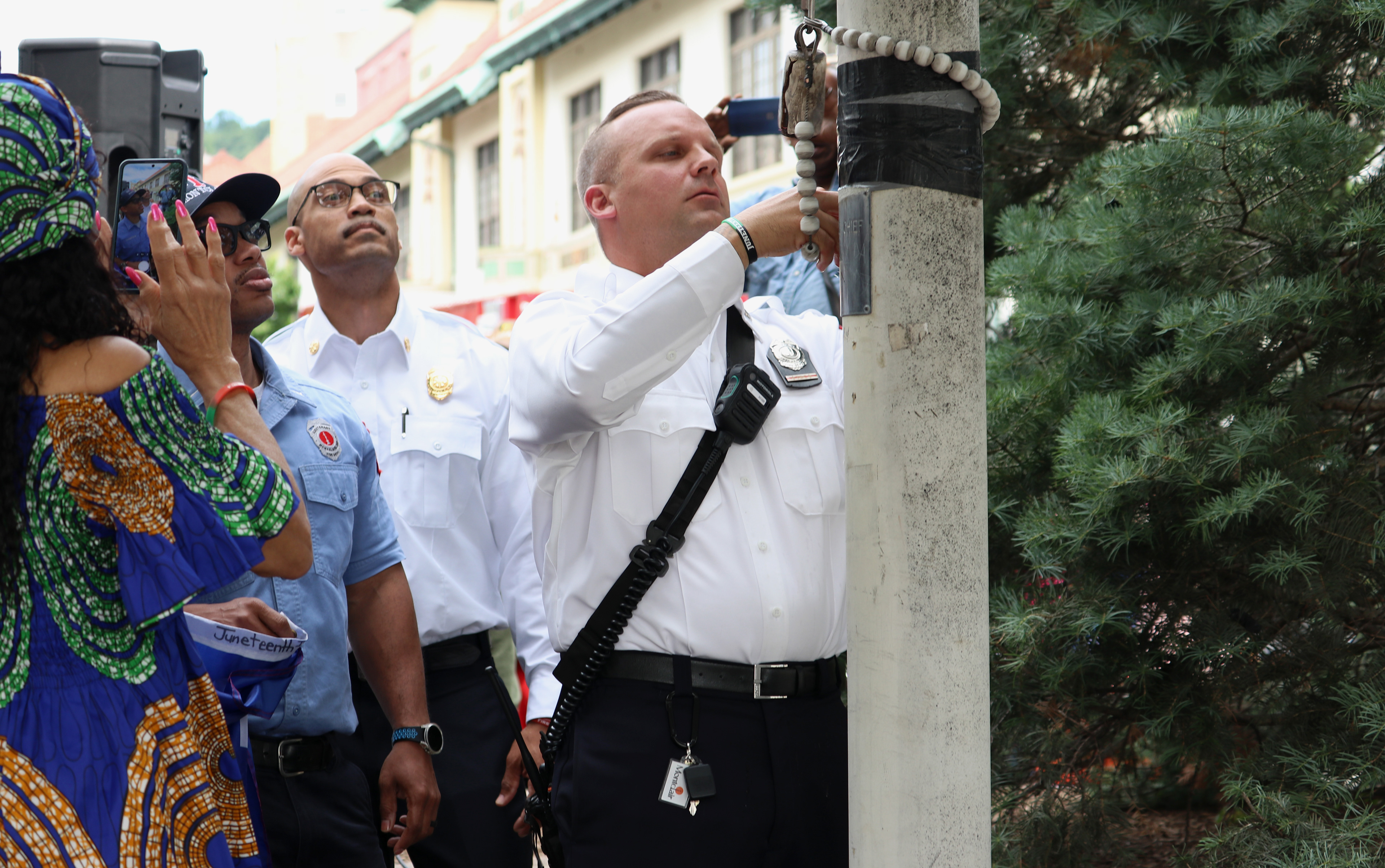 MONTCLAIR, NJ 06/19/2026 JUNETEENTH FLAG RAISING: Montclair Firefighters replace the Pride flag with a Juneteenth flag. Montclair residents gathered to honor and celebrate Juneteenth, listen to local politicians and leaders, and watch a performance by the students from Beyond the Boogie Dance Company. 