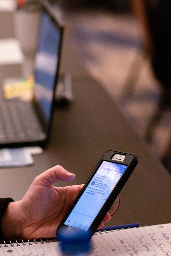 An attendee utilizing the Compound Connect App.