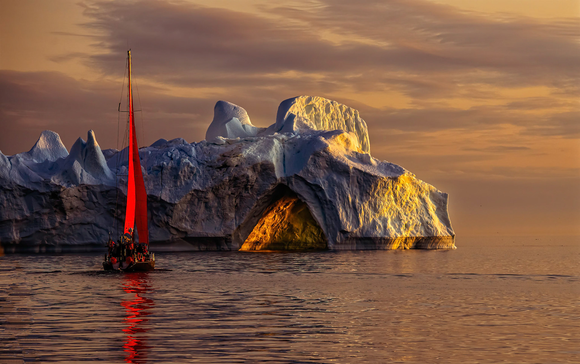 Sunset on the Red Sailboat