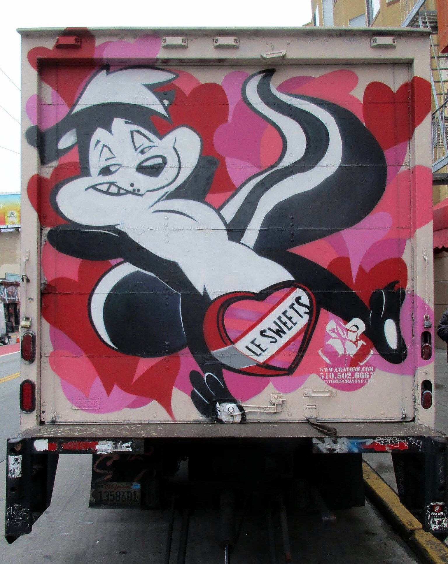 Pe Pe Lepew. Back of the Box Truck. it went from Hello Kitty to Grumpy the Cat to Pe Pe Lepew. SF, Ca. Mission District.