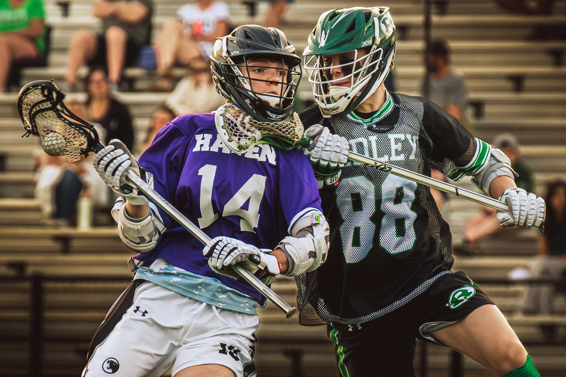 Sophomore attacker Jude Korb receives a stick to the throat by a Ridley defender on Thursday, April 23.