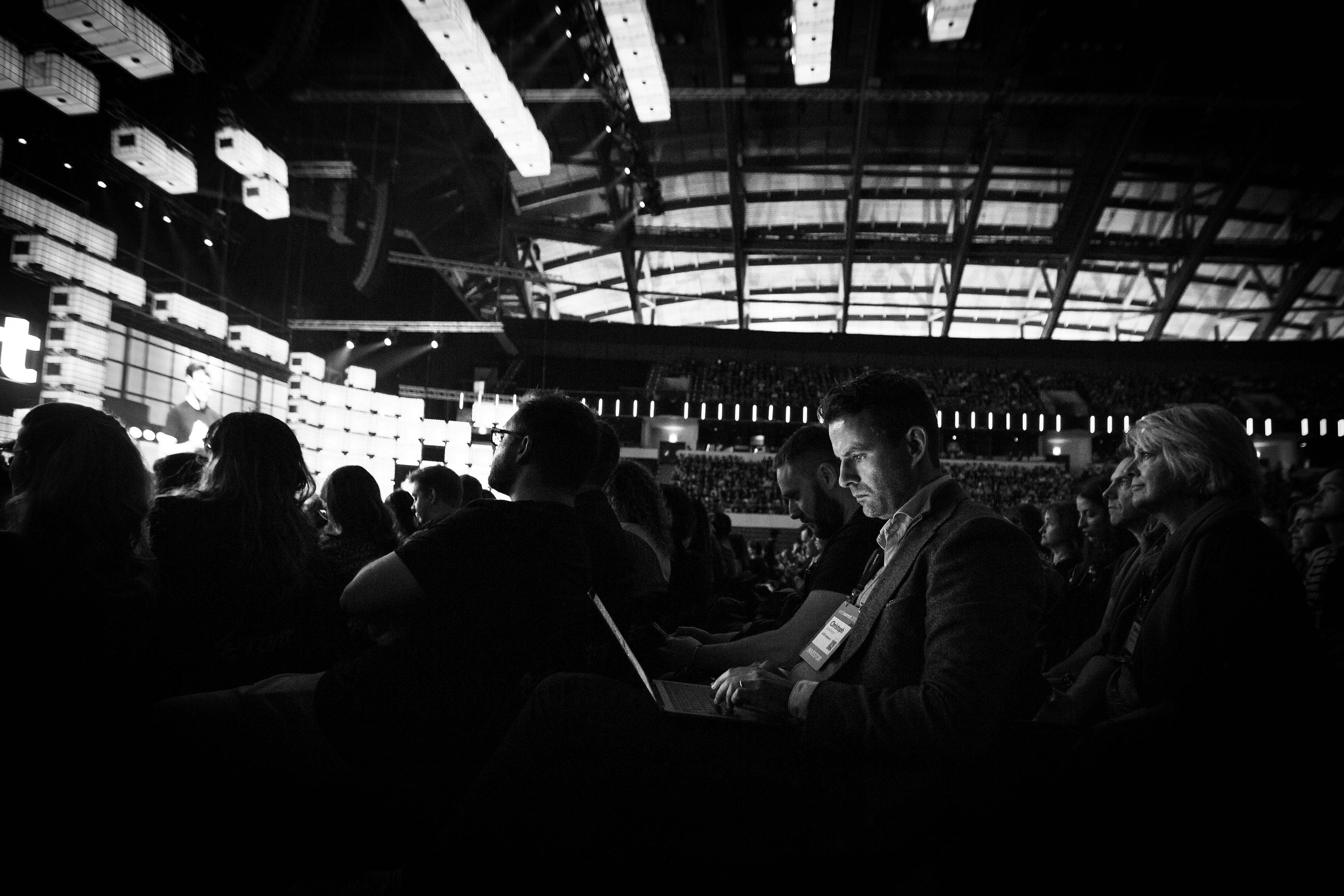 A man works during the opening ceremony of the summit
