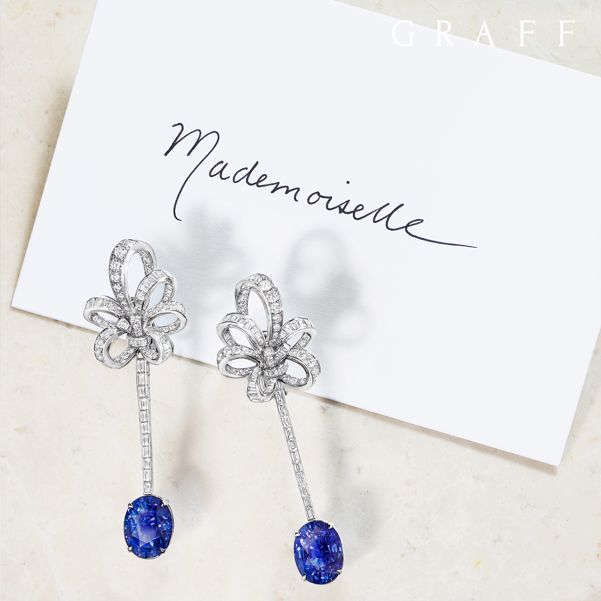 Graff Inspired by Twombly diamond earrings featuring sapphires weighing 8 carats each