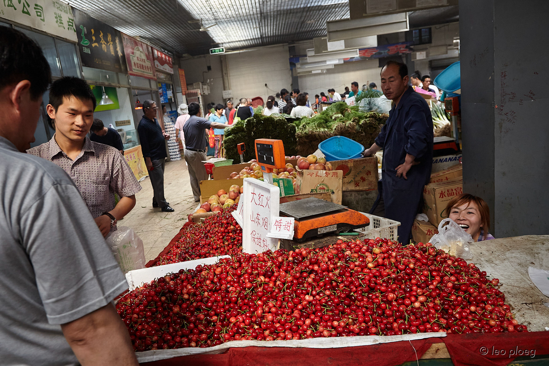Woman hiding behind Cherries