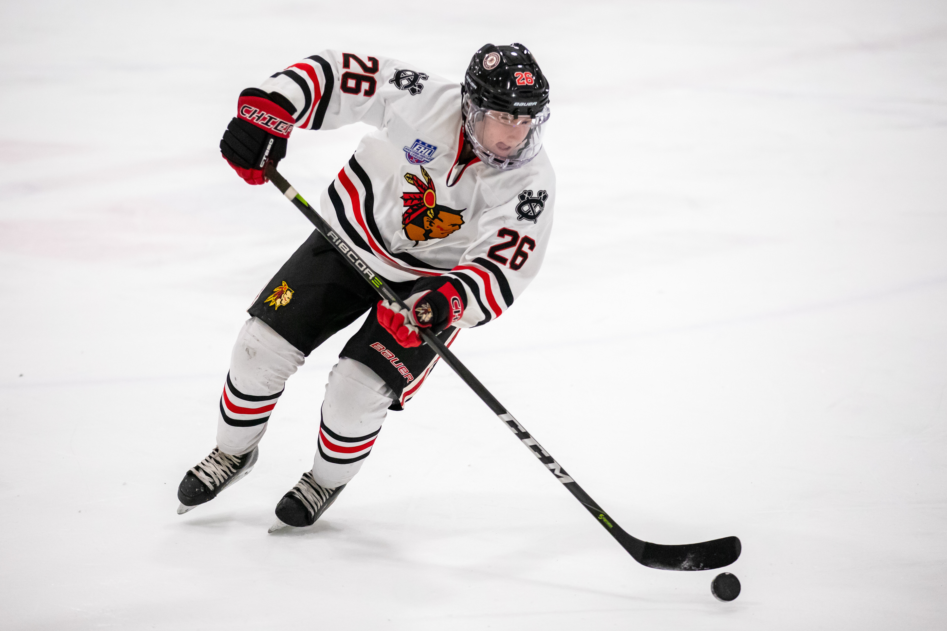 Evan Fassett focuses on the puck during a dangle.