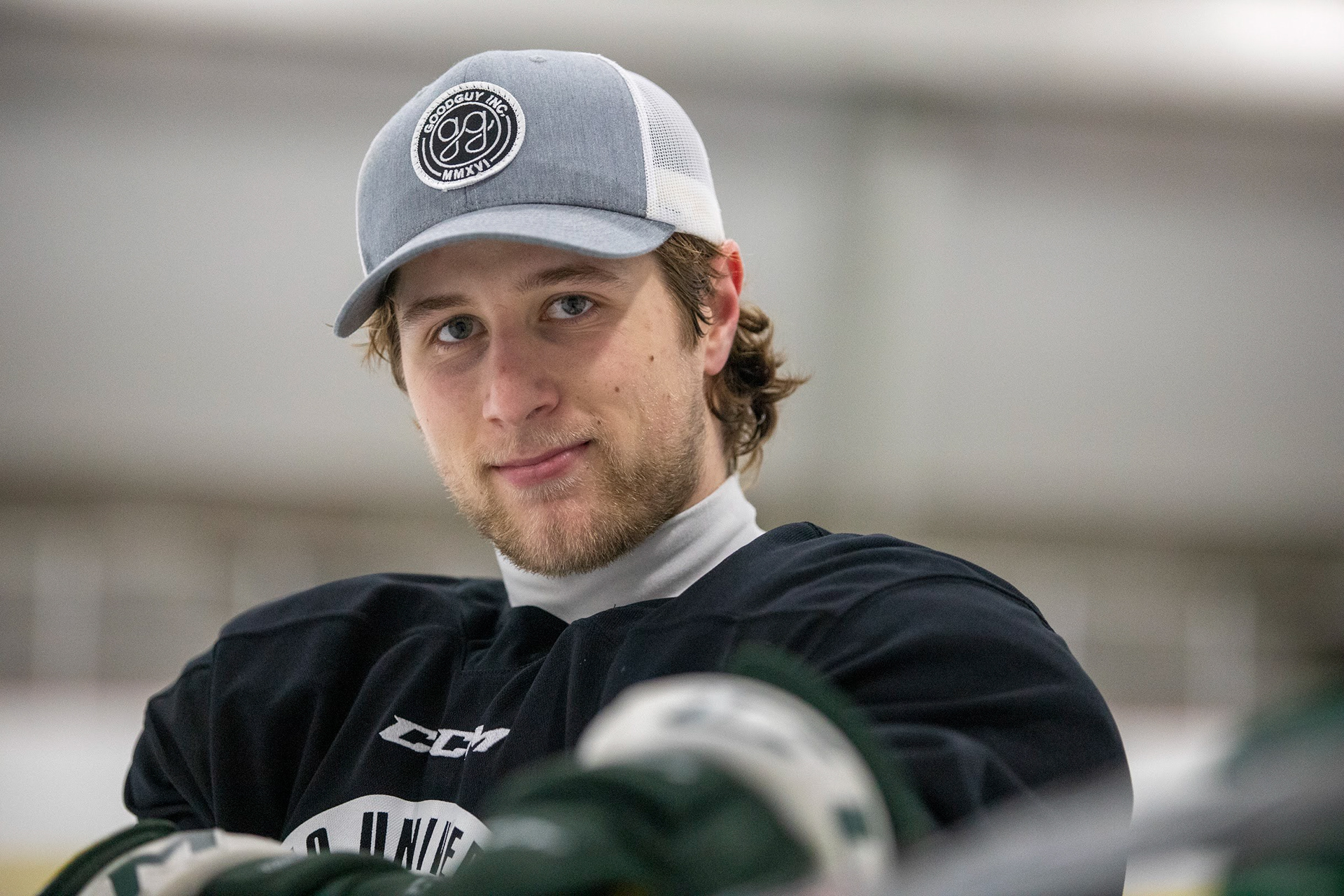 Gianni Evangelisti poses after practice, modeling his Good Guy Inc. hat.