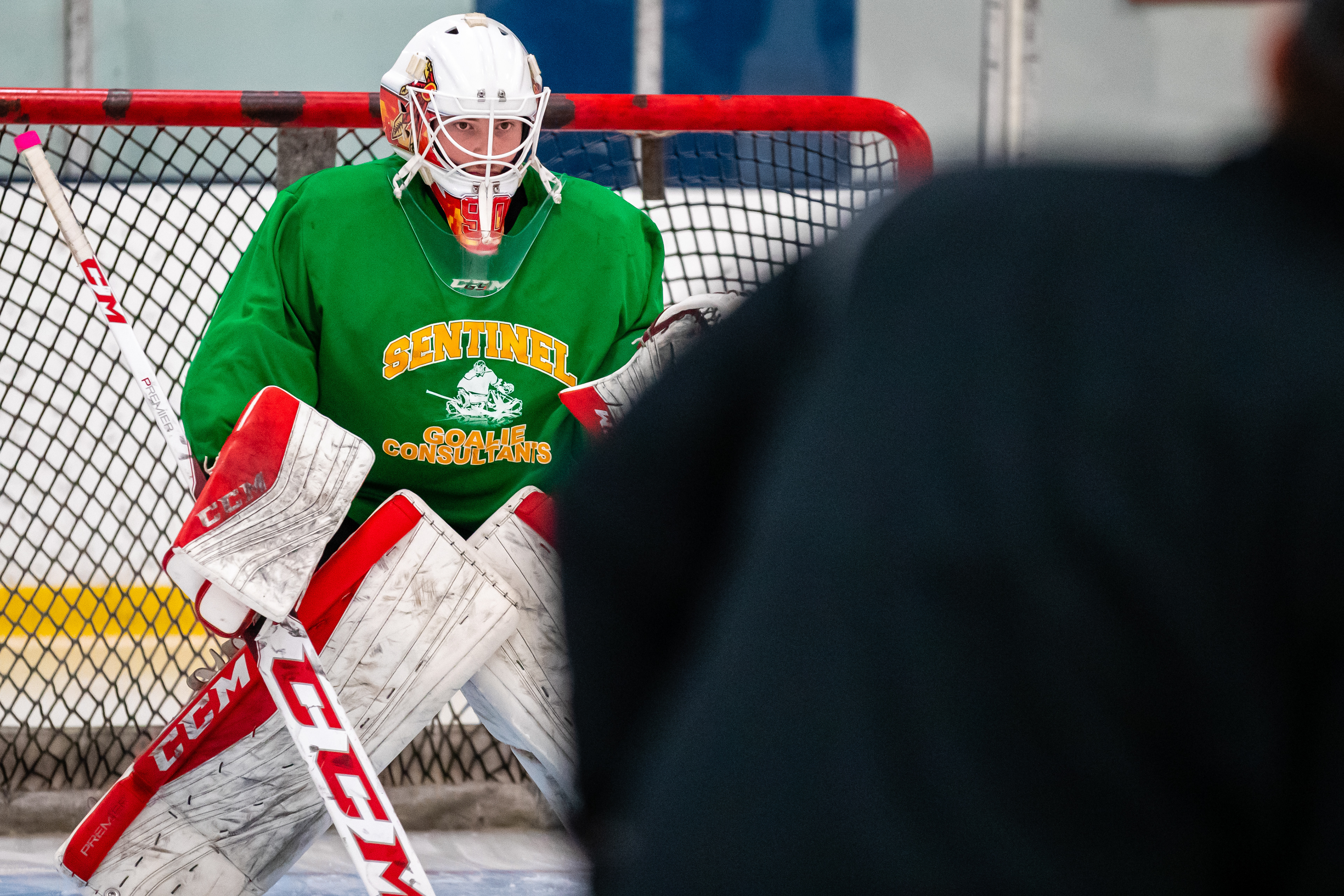 Alex Herman focuses on a coming shot during a training session.