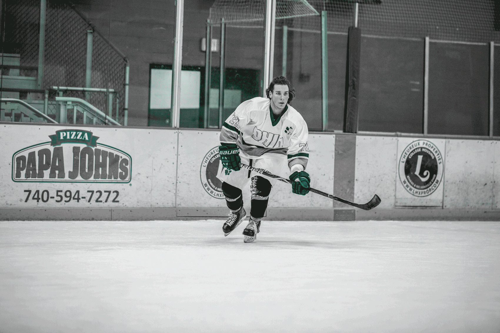 Tyler Harkins practices his one-timer while modeling the Bobcats' inaugural White Out jerseys.