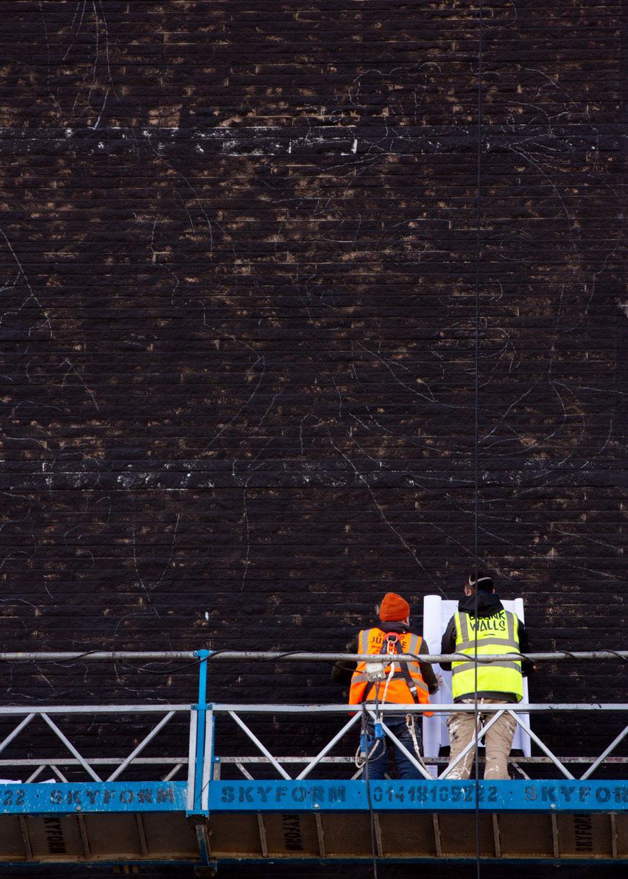 Stage Two Alex and Andy on the wall outling The Man UTD wall. 