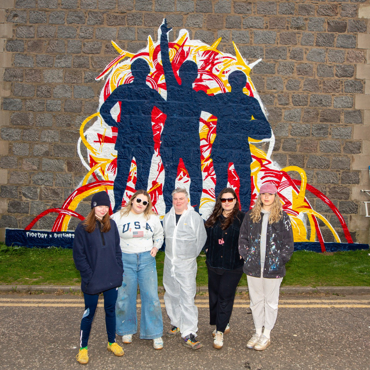 Job done. The United Holy Trinity mural is finally revealed — a collaborative work by artists Nina, Kirsty, Colin, Maddie and Naomi.