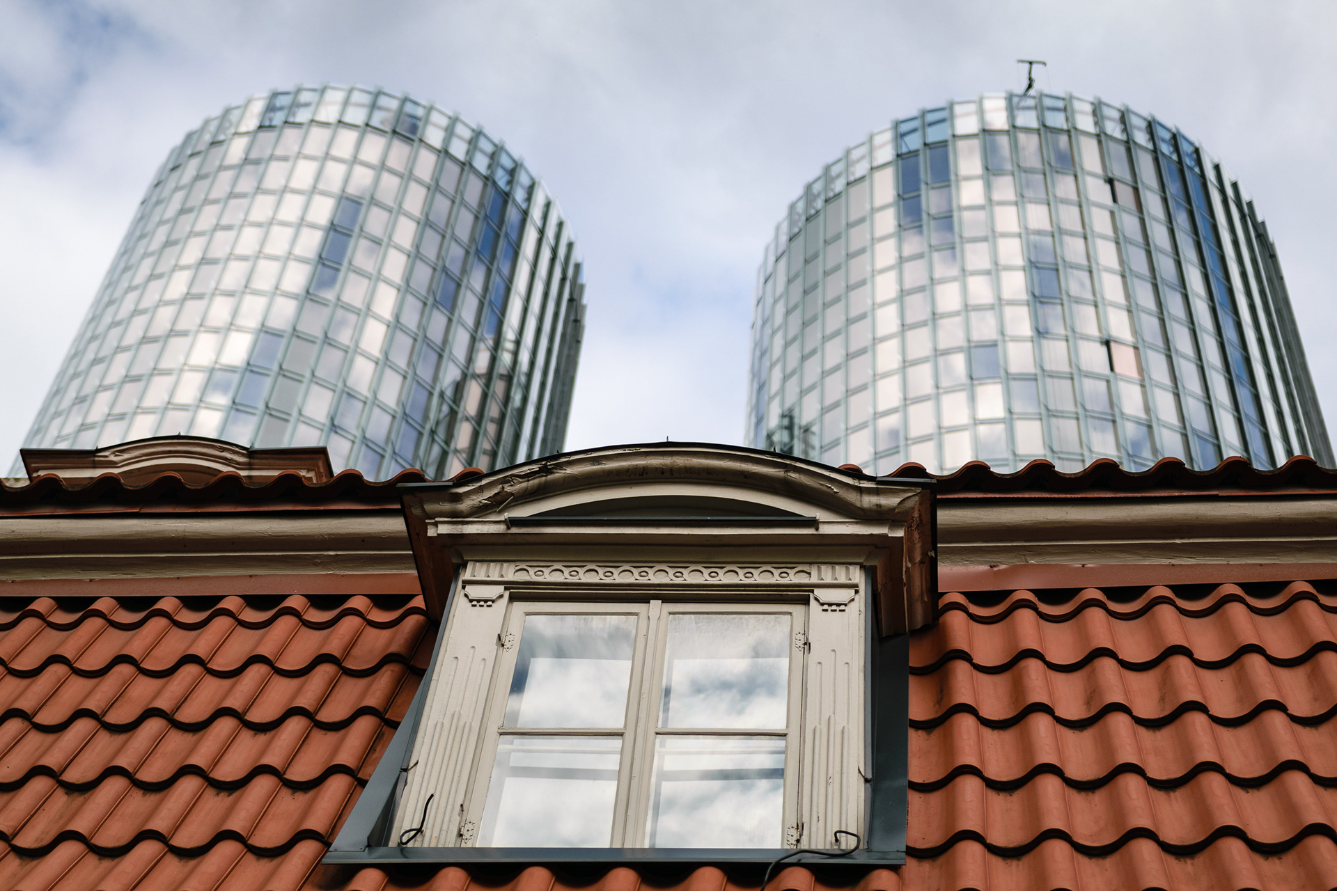 Old and New. Zunda towers in Riga