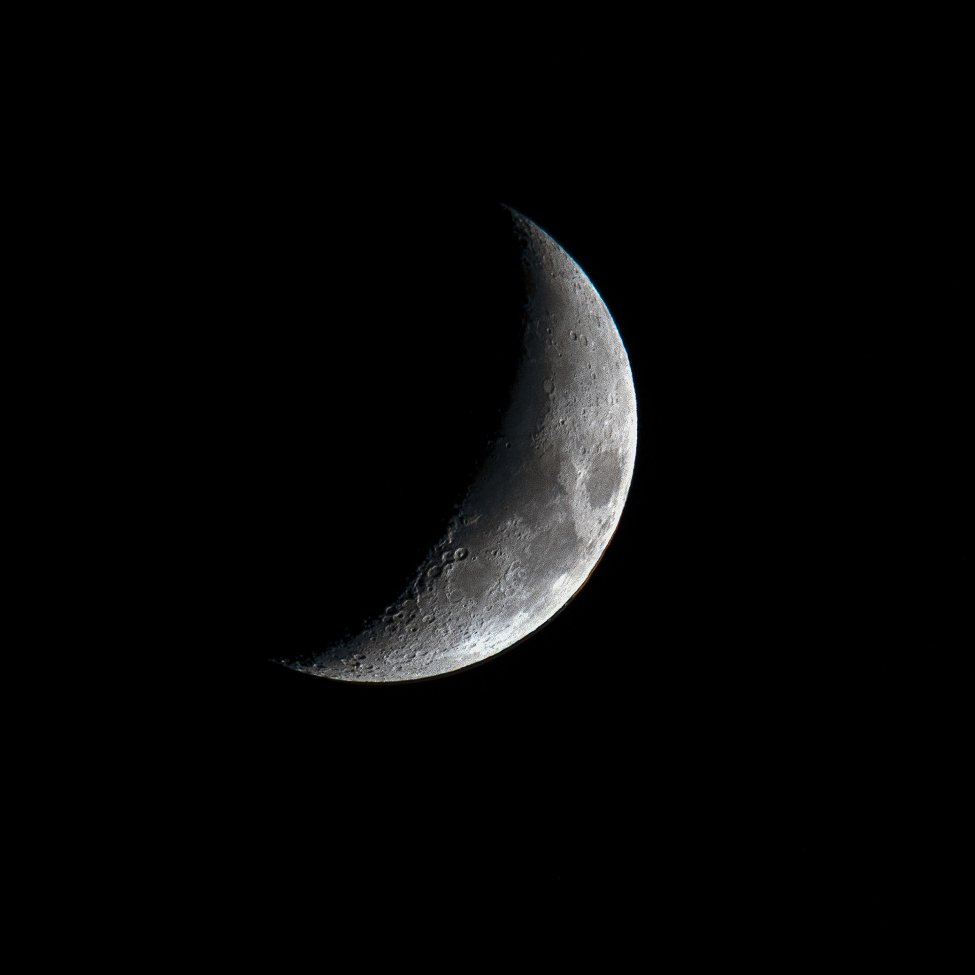 Waxing Cresent moon in a night sky