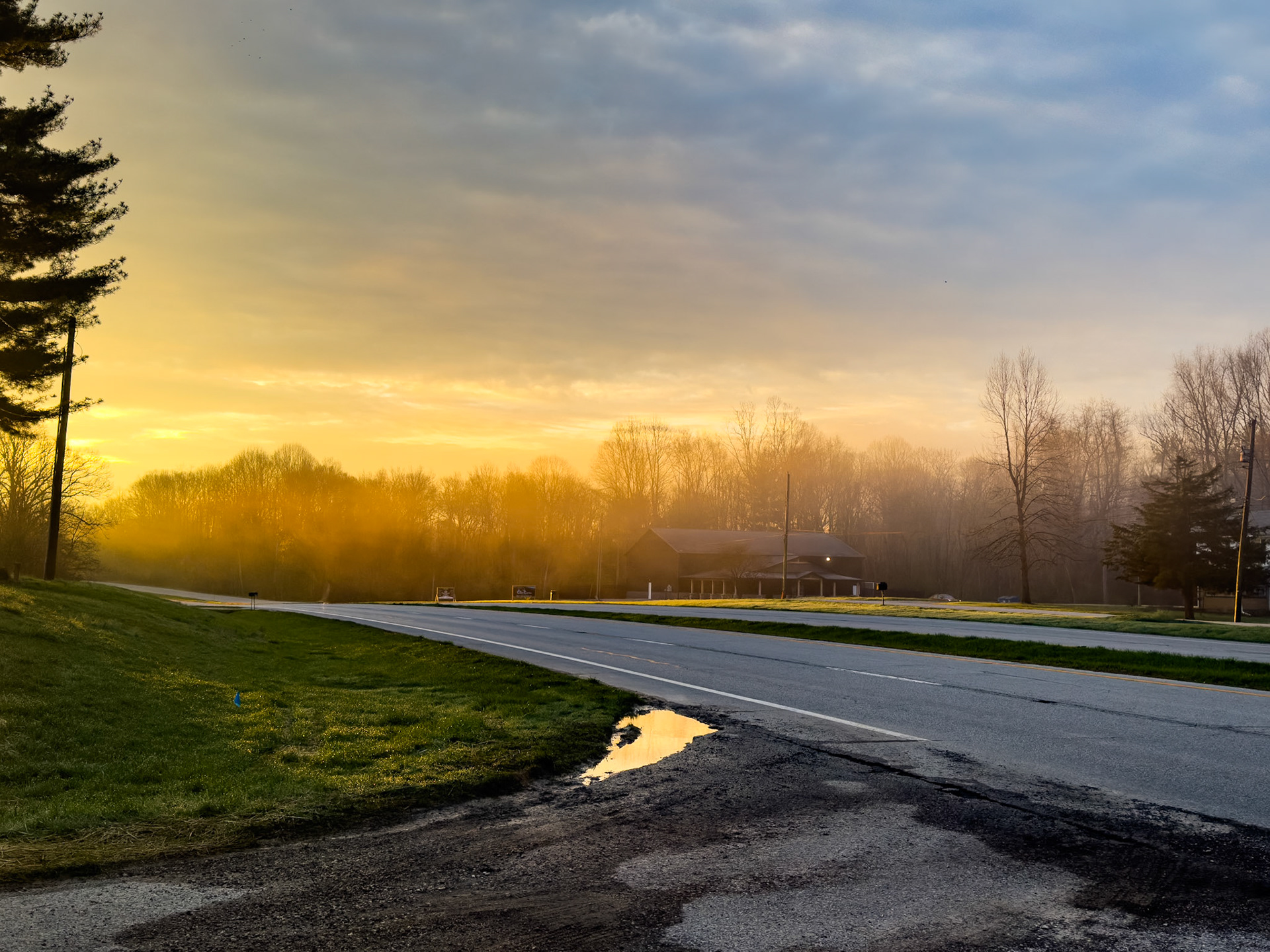 Morning fog burns off with day break